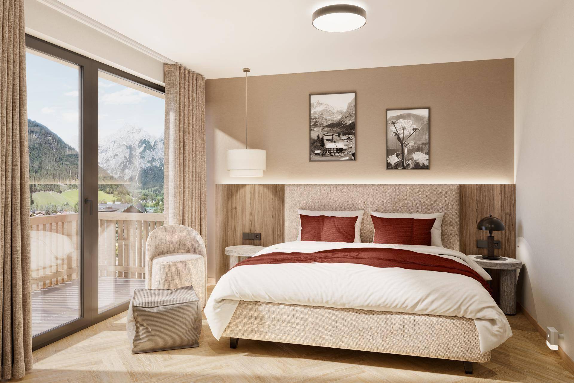 Helles Schlafzimmer mit Doppelbett, gemütlichem Sessel und Balkonzugang mit Bergblick.