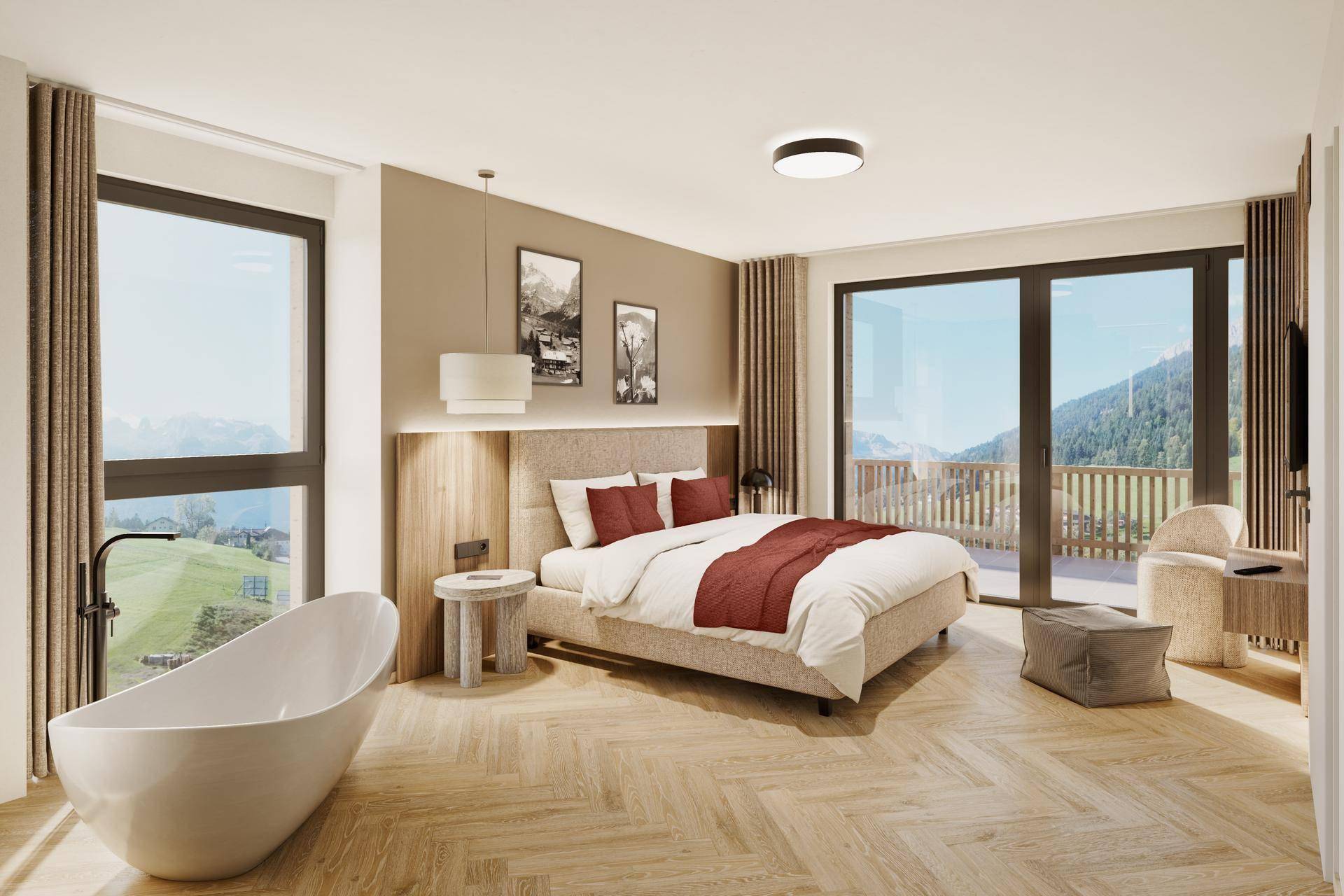 Großes Schlafzimmer mit freistehender Badewanne und Panoramafenstern mit Bergblick.