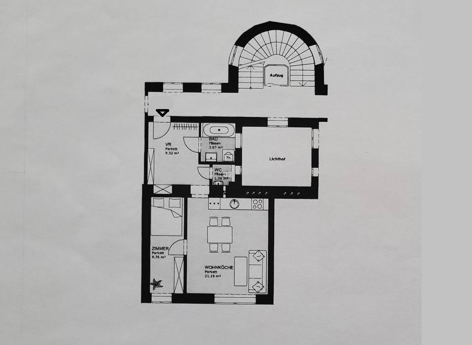 Grundriss einer Wohnung mit Wohnküche, Schlafzimmer, Bad und separatem WC.
