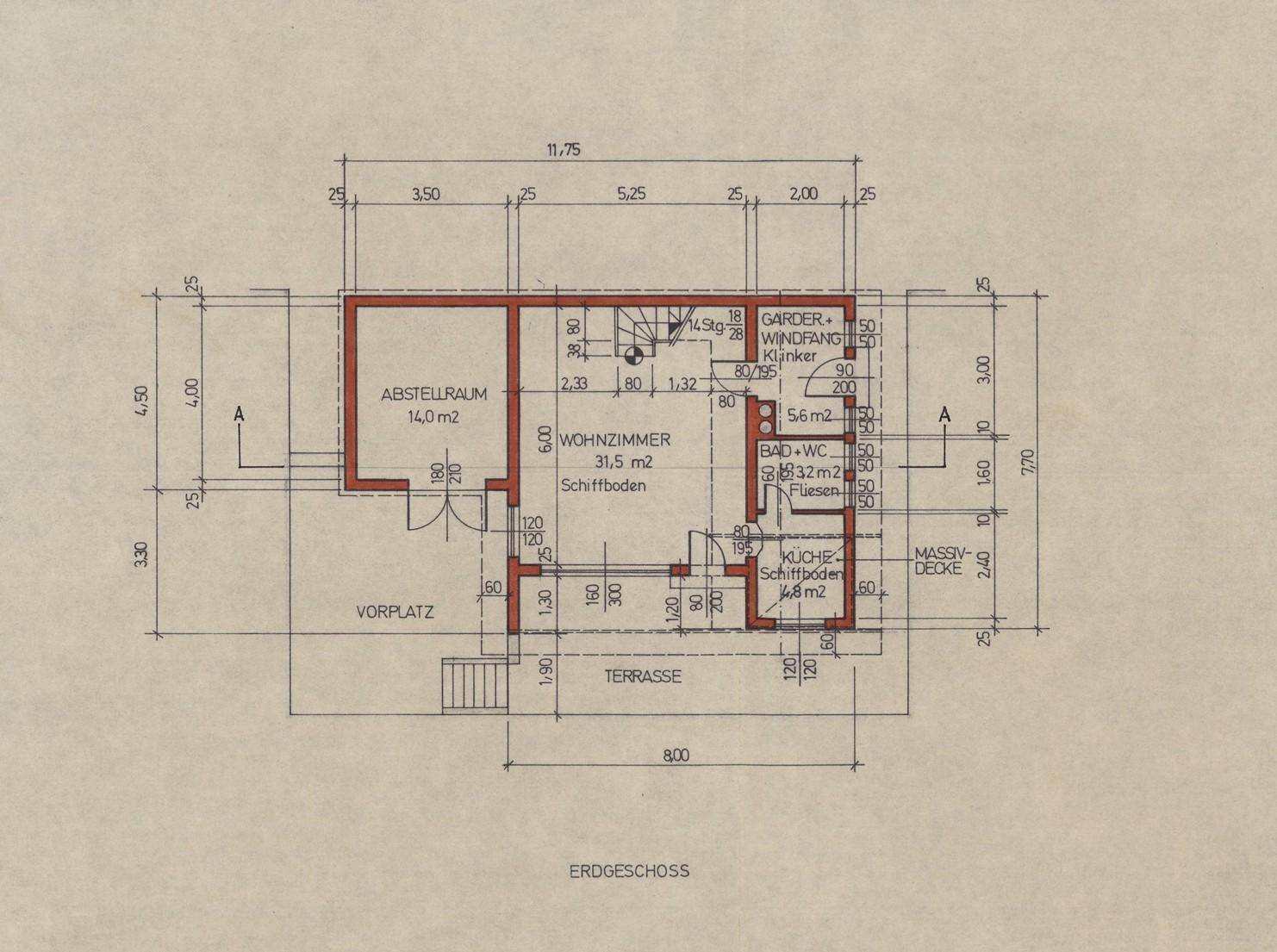 Grundriss des Erdgeschosses mit Wohnzimmer, Küche, Bad und Terrasse.
