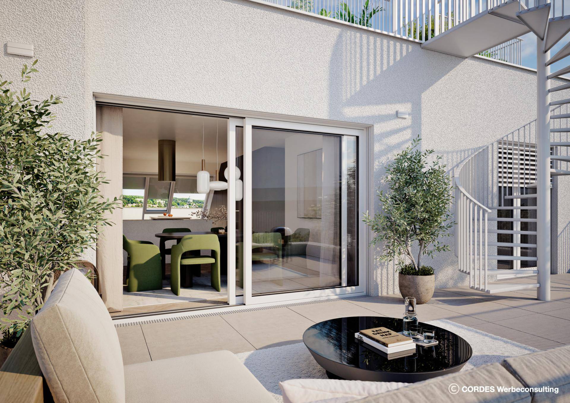 Geräumige Dachterrasse mit Sitzgelegenheiten und einer Wendeltreppe zu einer weiteren Ebene.