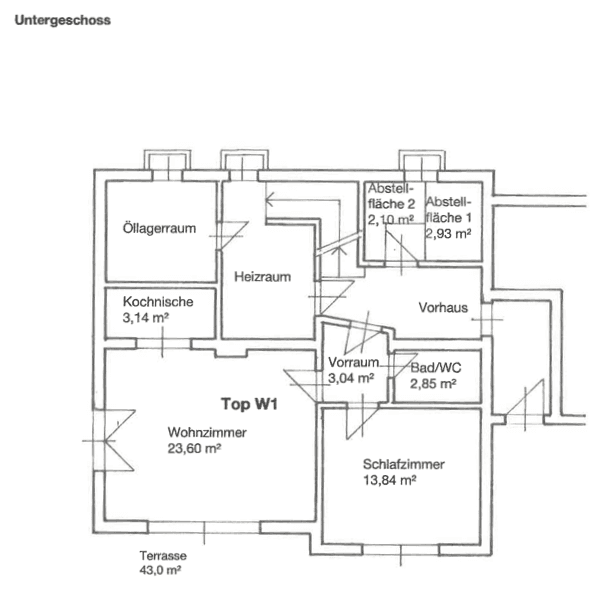 Grundriss des Untergeschosses mit Wohnzimmer, Schlafzimmer, Bad und Terrasse.