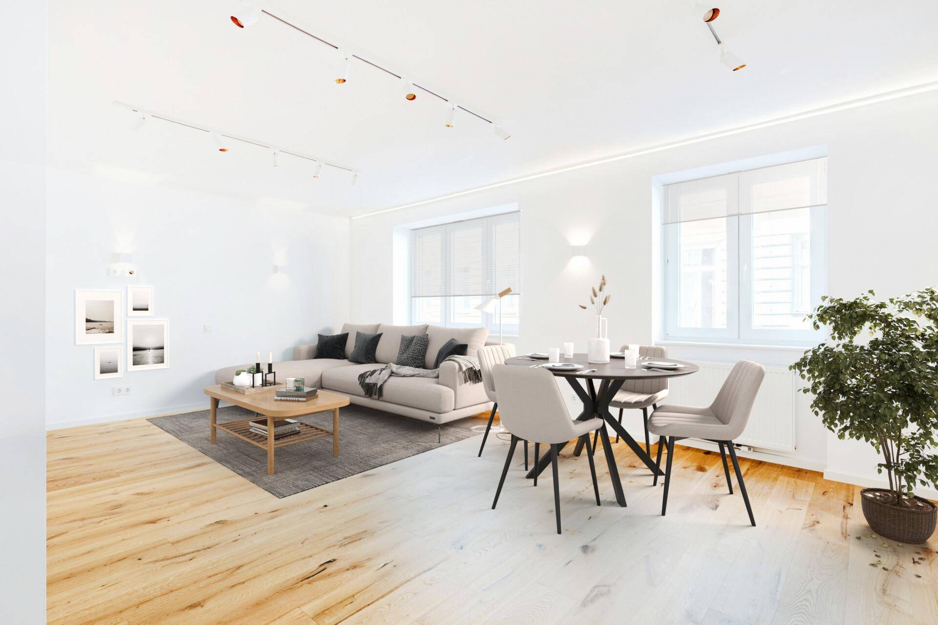 Gemütlicher Wohn-Essbereich mit bequemer Couch, Esstisch und hellem Holzboden, ideal für Entspannung.