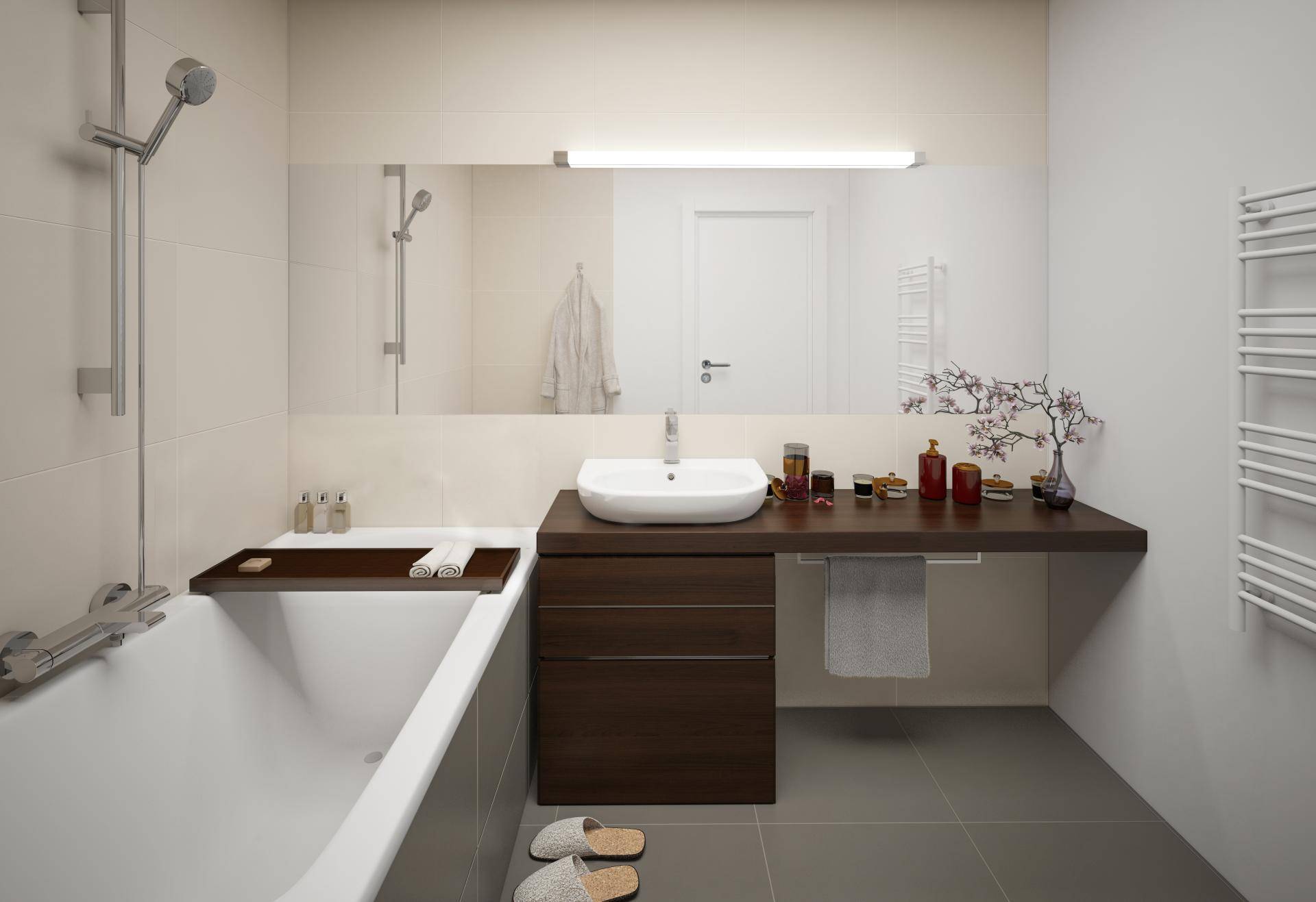 Modernes Badezimmer mit Badewanne, Einzelwaschbecken und beheiztem Handtuchhalter in neutralen Farben.