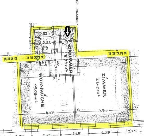 Grundriss einer Wohnung mit Wohnküche, Vorzimmer und einem weiteren Zimmer.