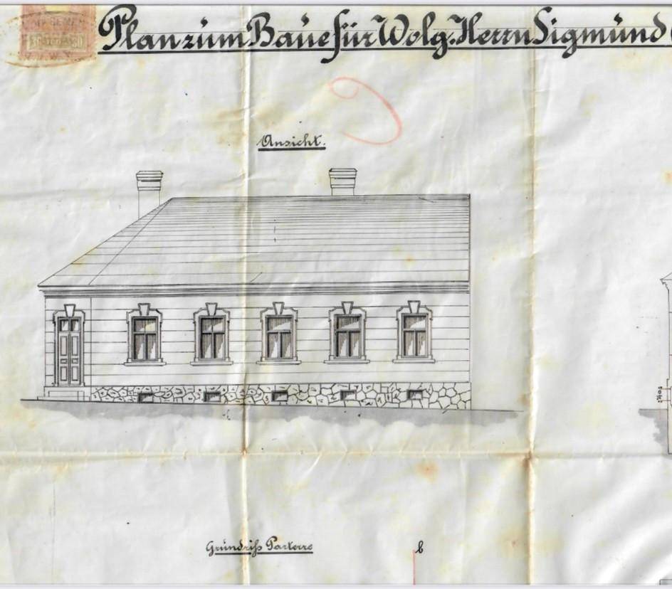 Historischer Bauplan der Fassadenansicht eines Gebäudes mit traditionellen Fenstern.