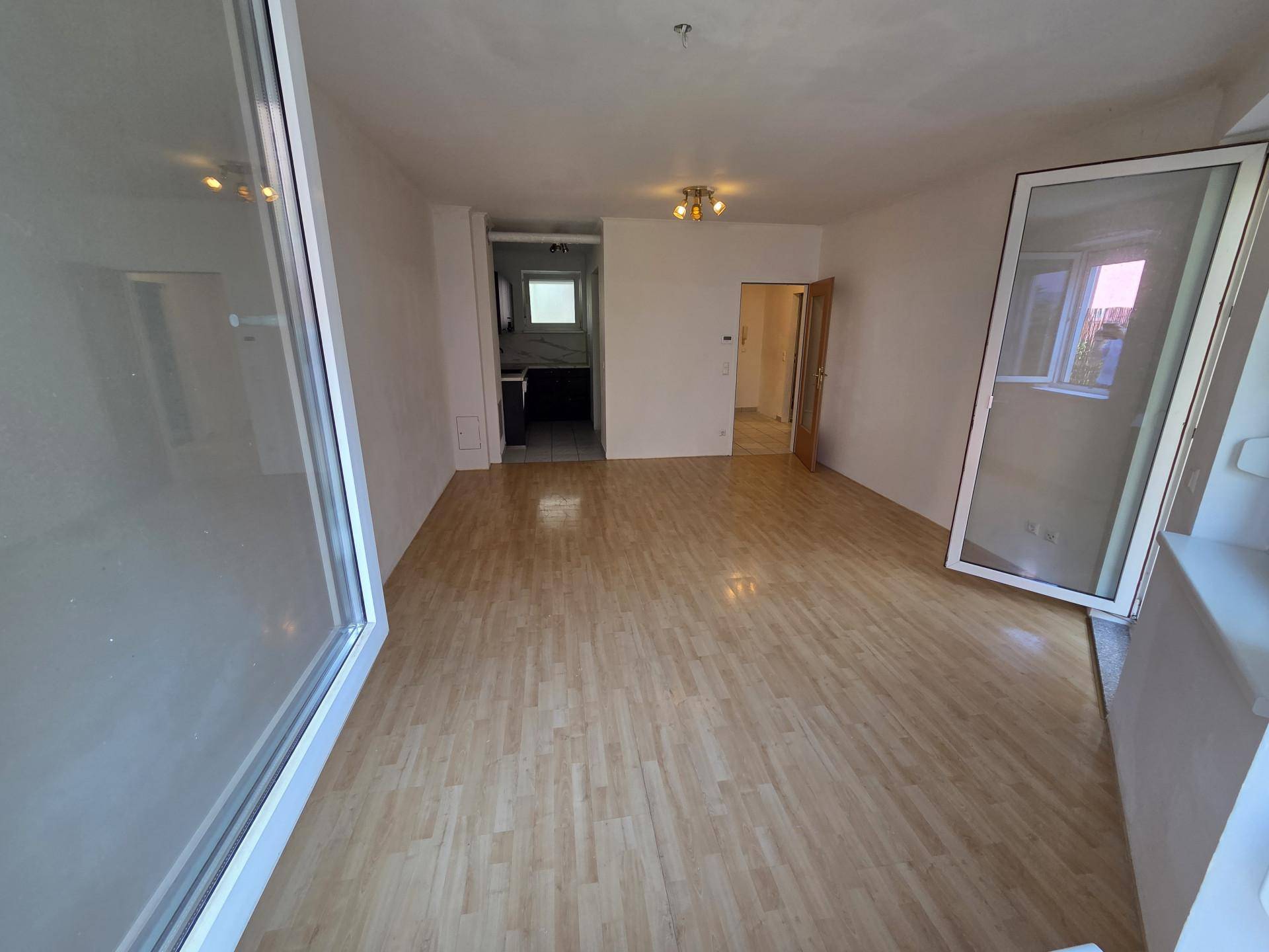 Barrierefreie Zweizimmerwohnung mit Eigengarten und Tiefgaragenstellplatz! - Ansicht 3