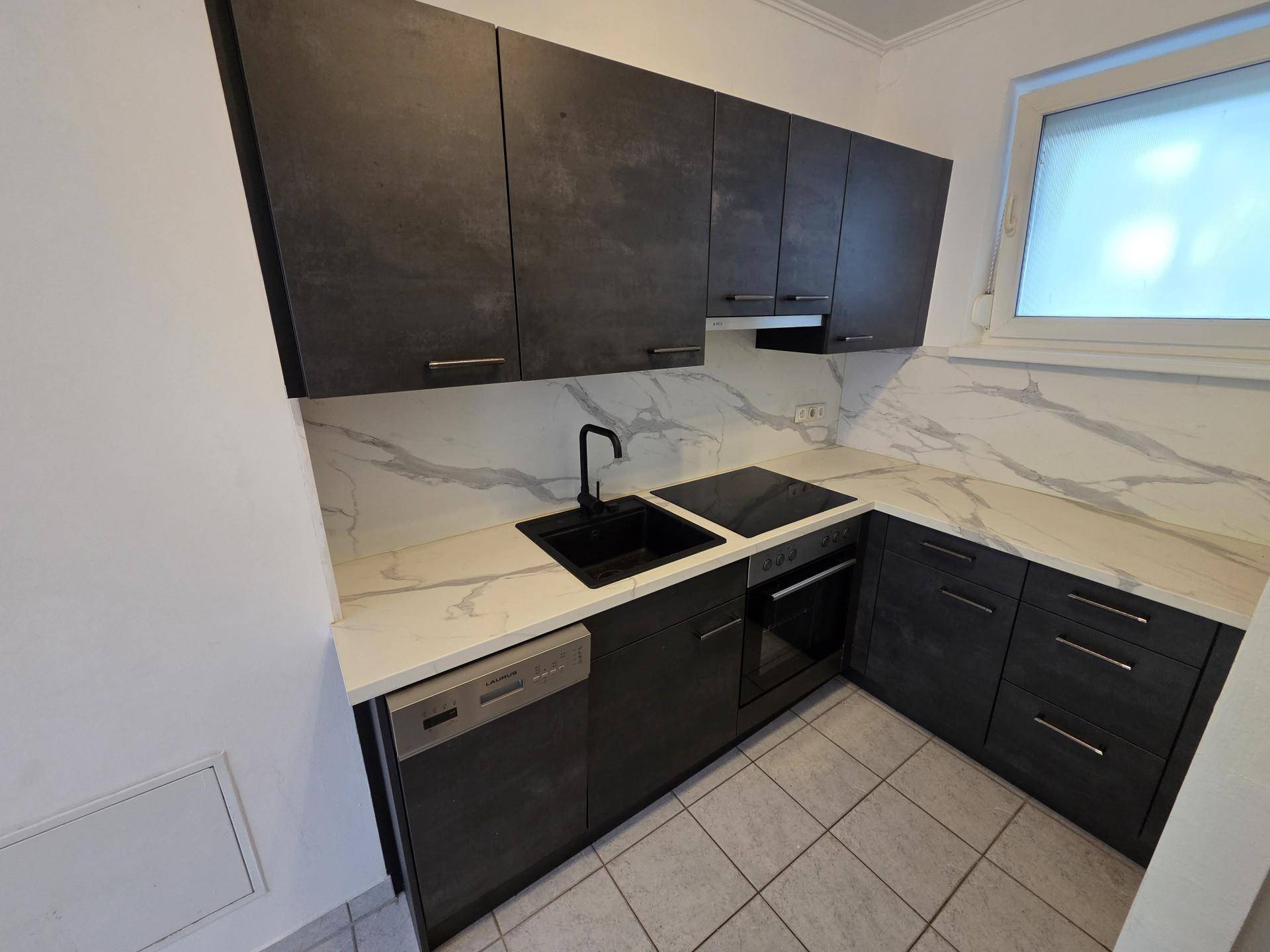 Barrierefreie Zweizimmerwohnung mit Eigengarten und Tiefgaragenstellplatz! - Ansicht 2