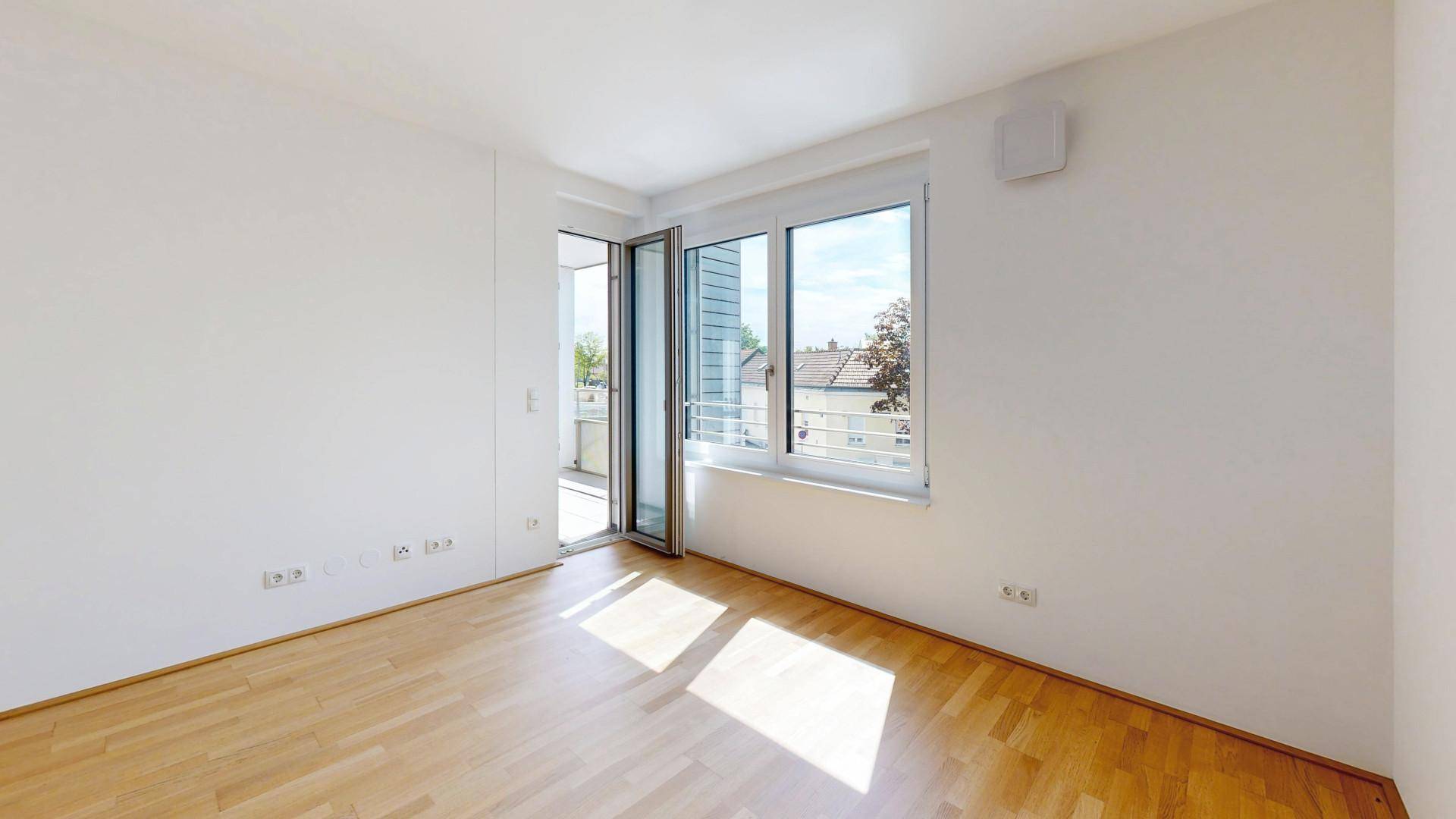 Wohnraum mit Ausgang auf Terrasse