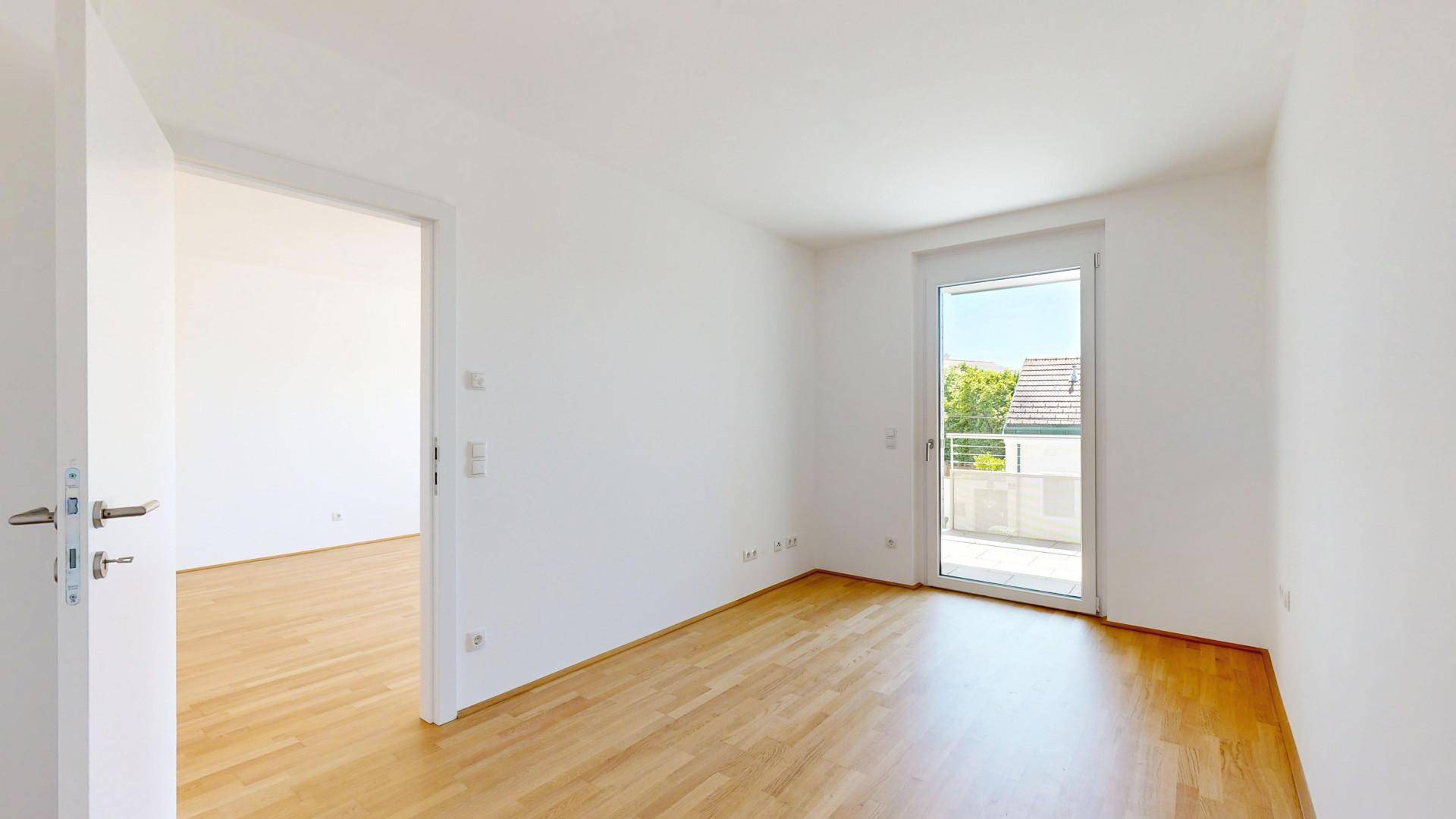 Schlafzimmer mit Blick in den Wohnraum