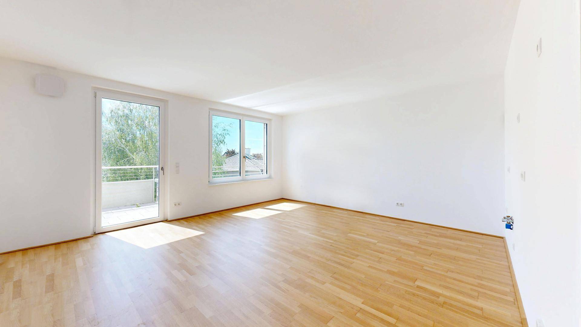 Küche mit Wohnraum und Ausgang auf Terrasse