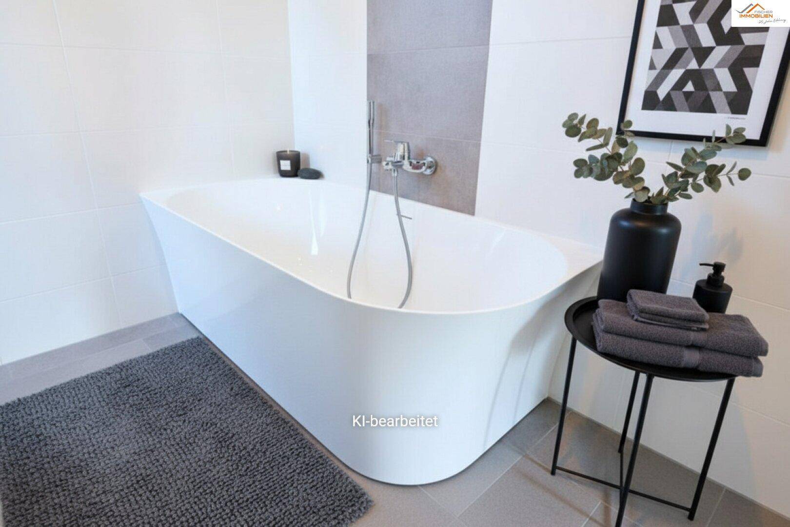 Modernes Badezimmer mit freistehender Badewanne, grauen Fliesen und minimalistischer Dekoration.