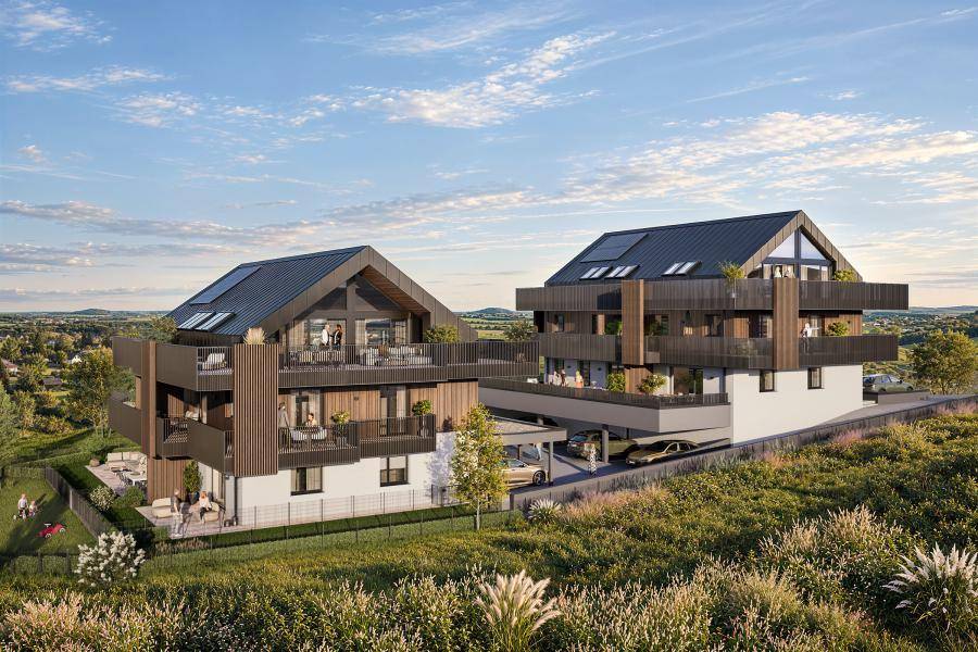 Zwei moderne Mehrfamilienhäuser in grüner Umgebung mit Balkonen und Carports.
