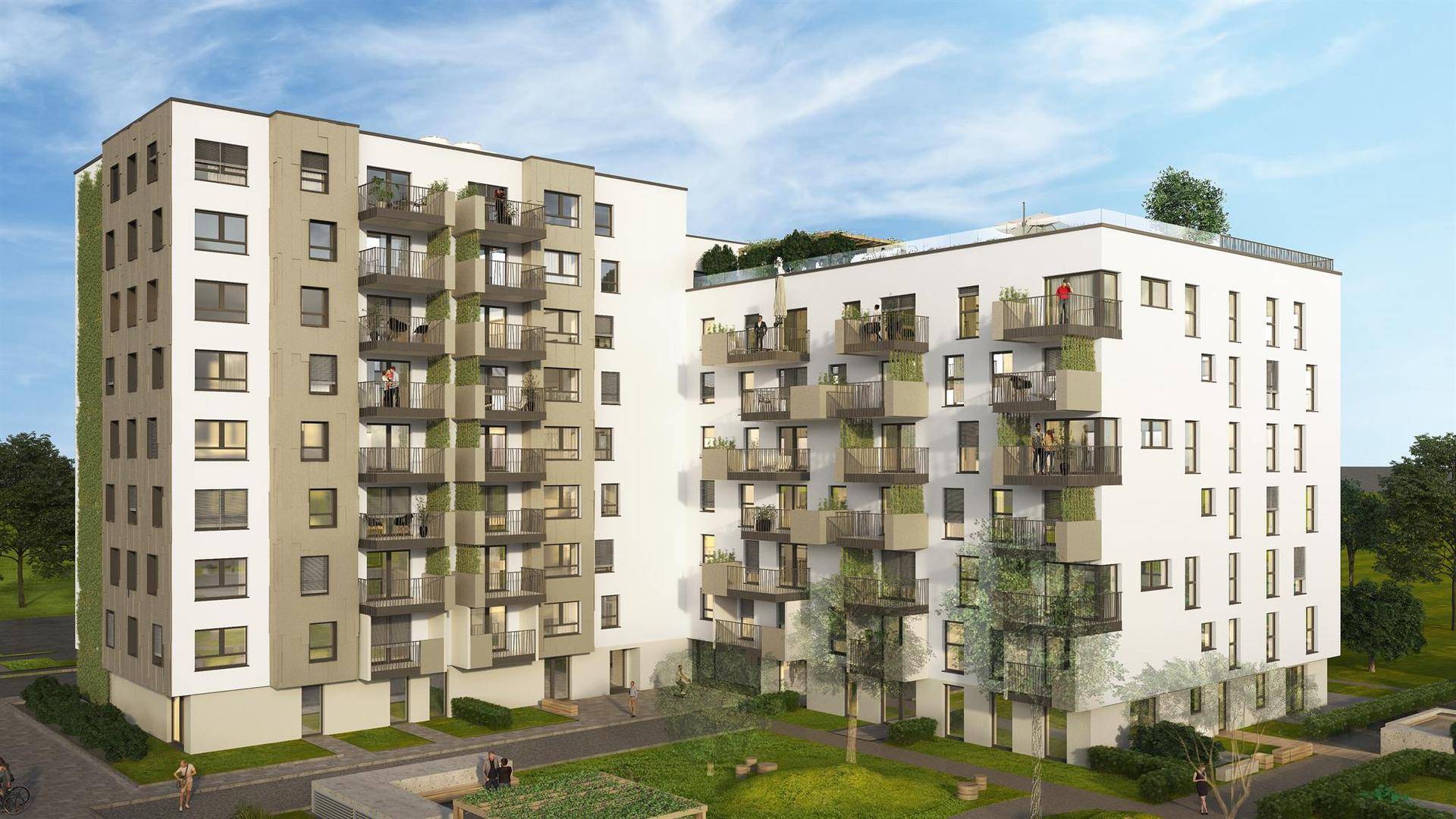 Moderne Wohngebäude mit hellen Fassaden, Balkonen und begrünten Innenhöfen.