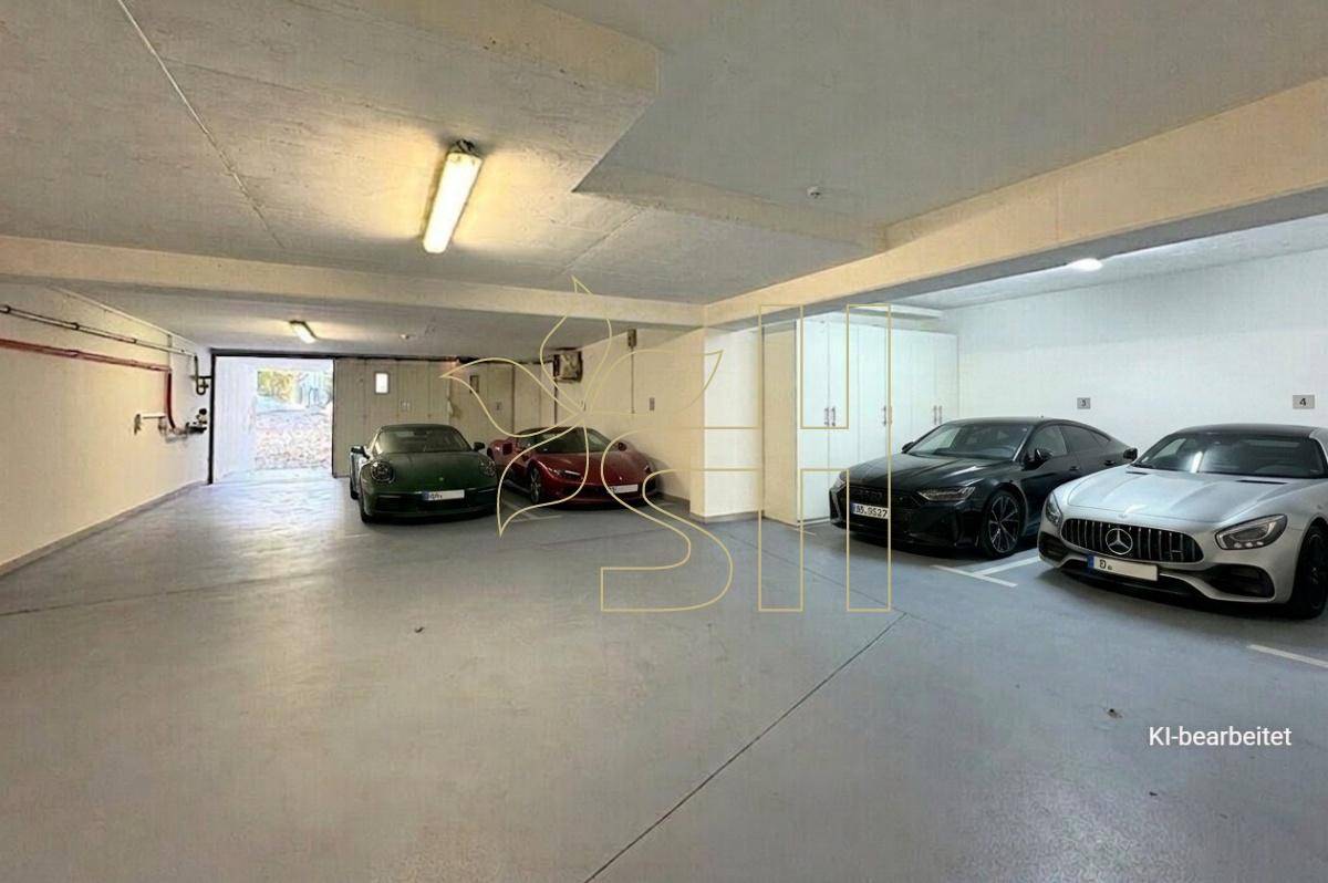 Geräumige Tiefgarage mit Platz für mehrere Fahrzeuge und direktem Zugang zum Haus.