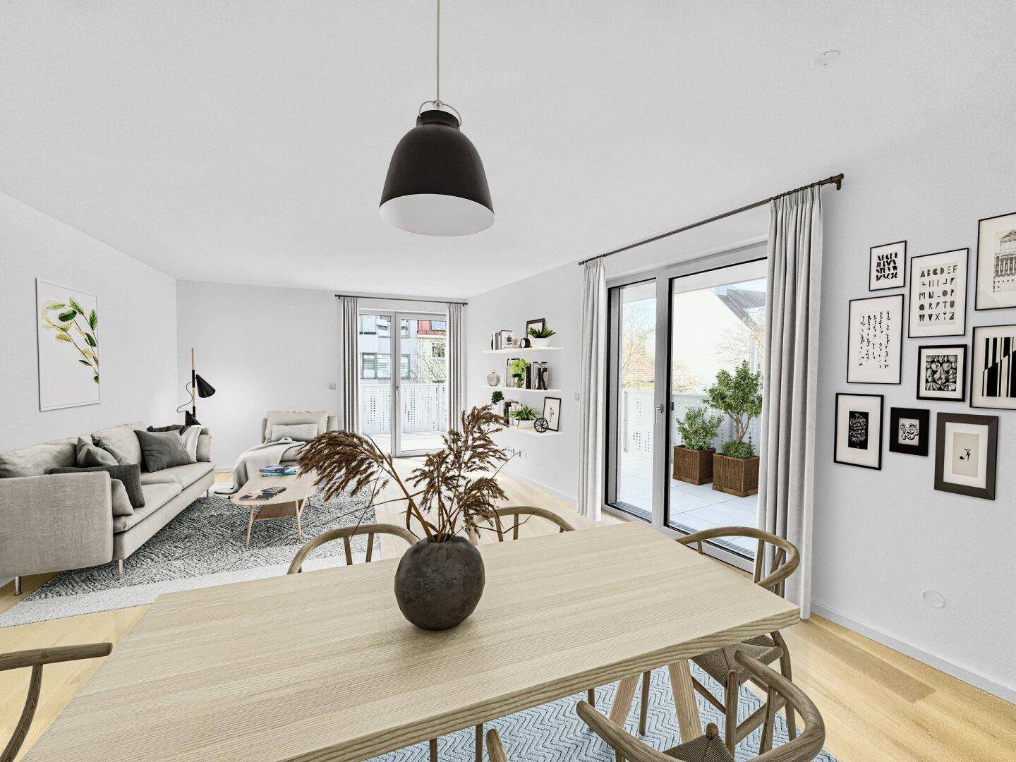 Heller, offener Wohn-Essbereich mit modernem Design und Zugang zu einer Terrasse.