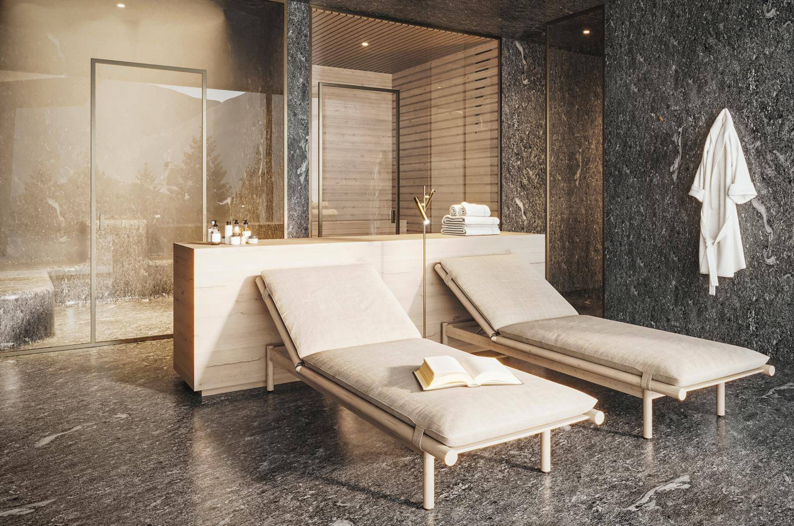 Exklusiver Wellnessbereich mit Sauna, bequemen Liegen und dunklen Natursteinwänden für entspannende Momente.
