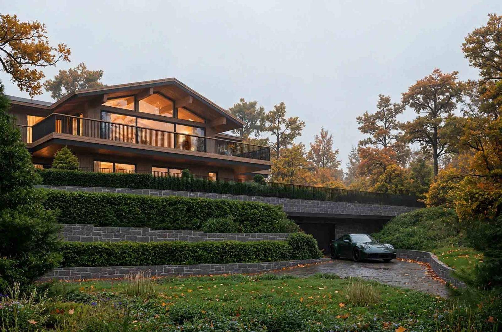 Moderne Villa in herbstlicher Umgebung mit grüner Bepflanzung und integrierter Garage.