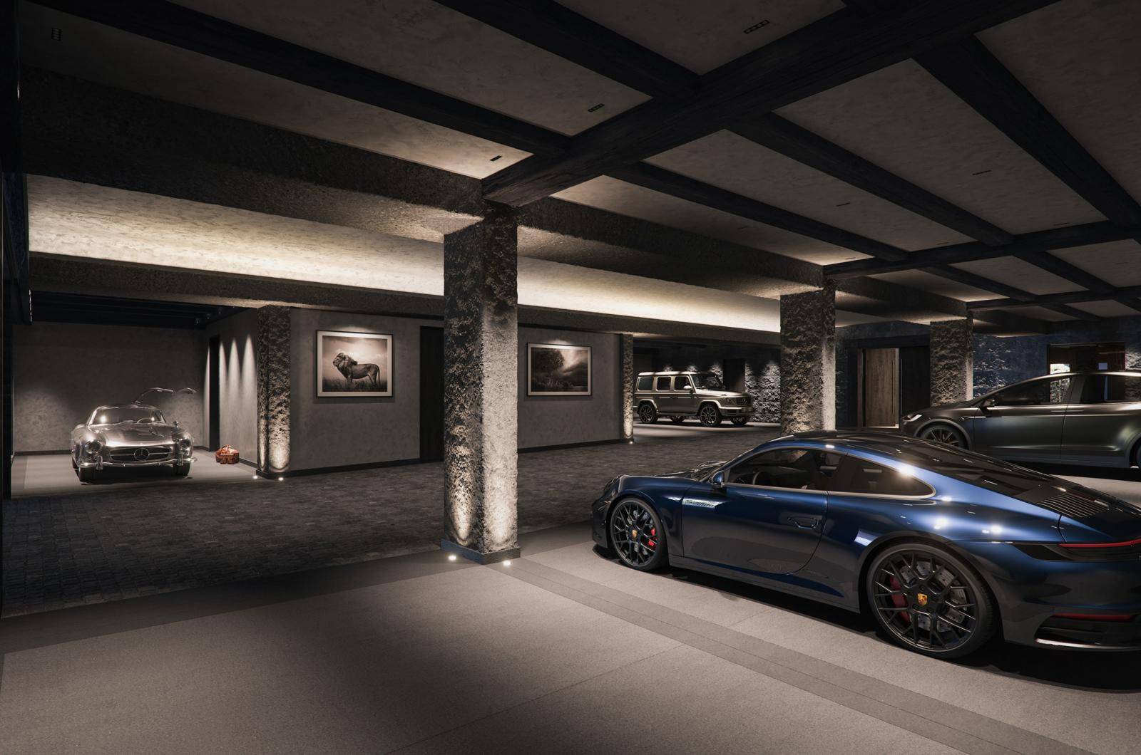 Geräumige Tiefgarage mit mehreren Stellplätzen für Luxusfahrzeuge und stilvoller Beleuchtung.