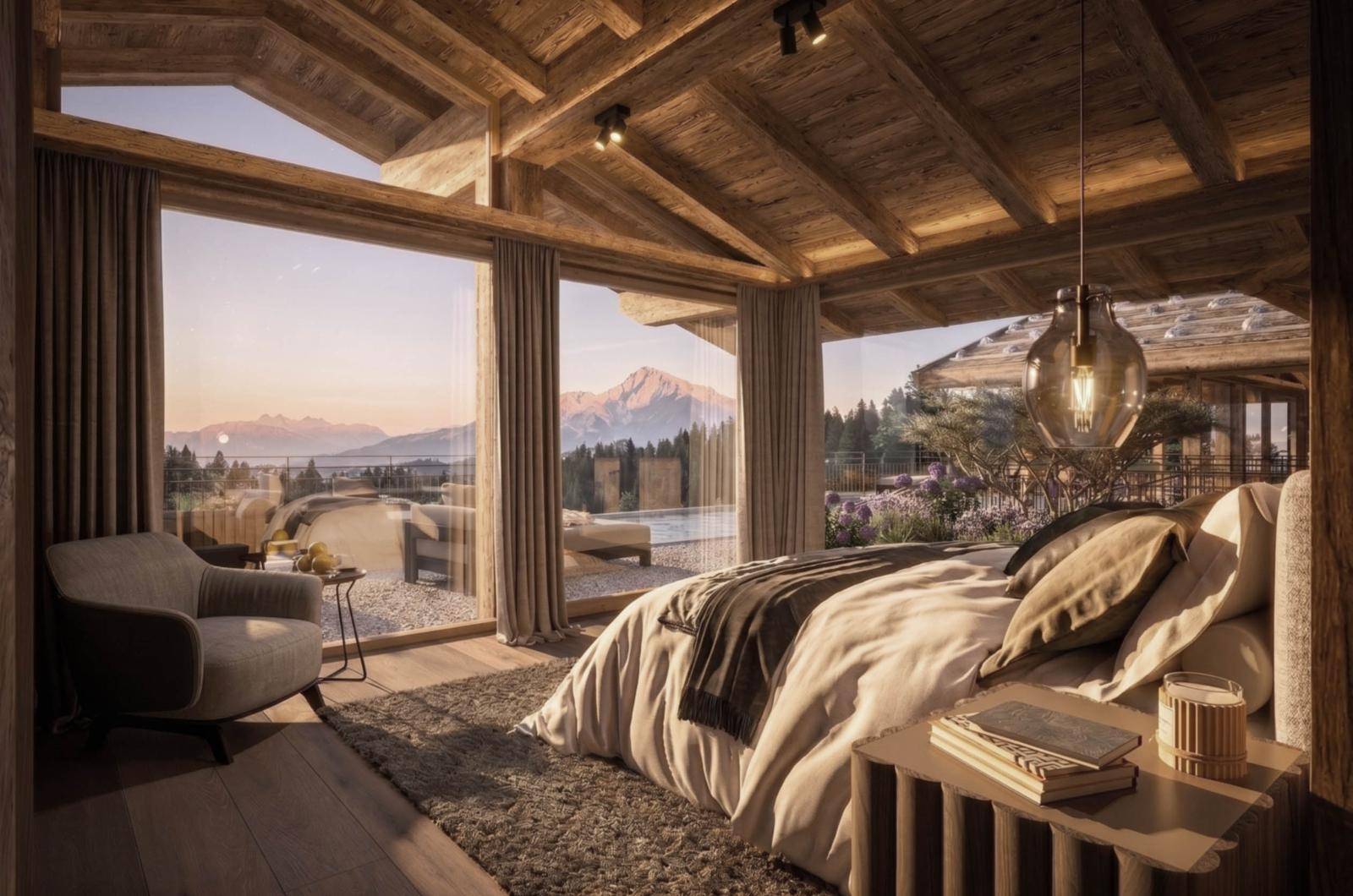 Luxuriöses Schlafzimmer mit raumhohen Fenstern, Holzelementen und spektakulärem Bergblick bei Sonnenuntergang.