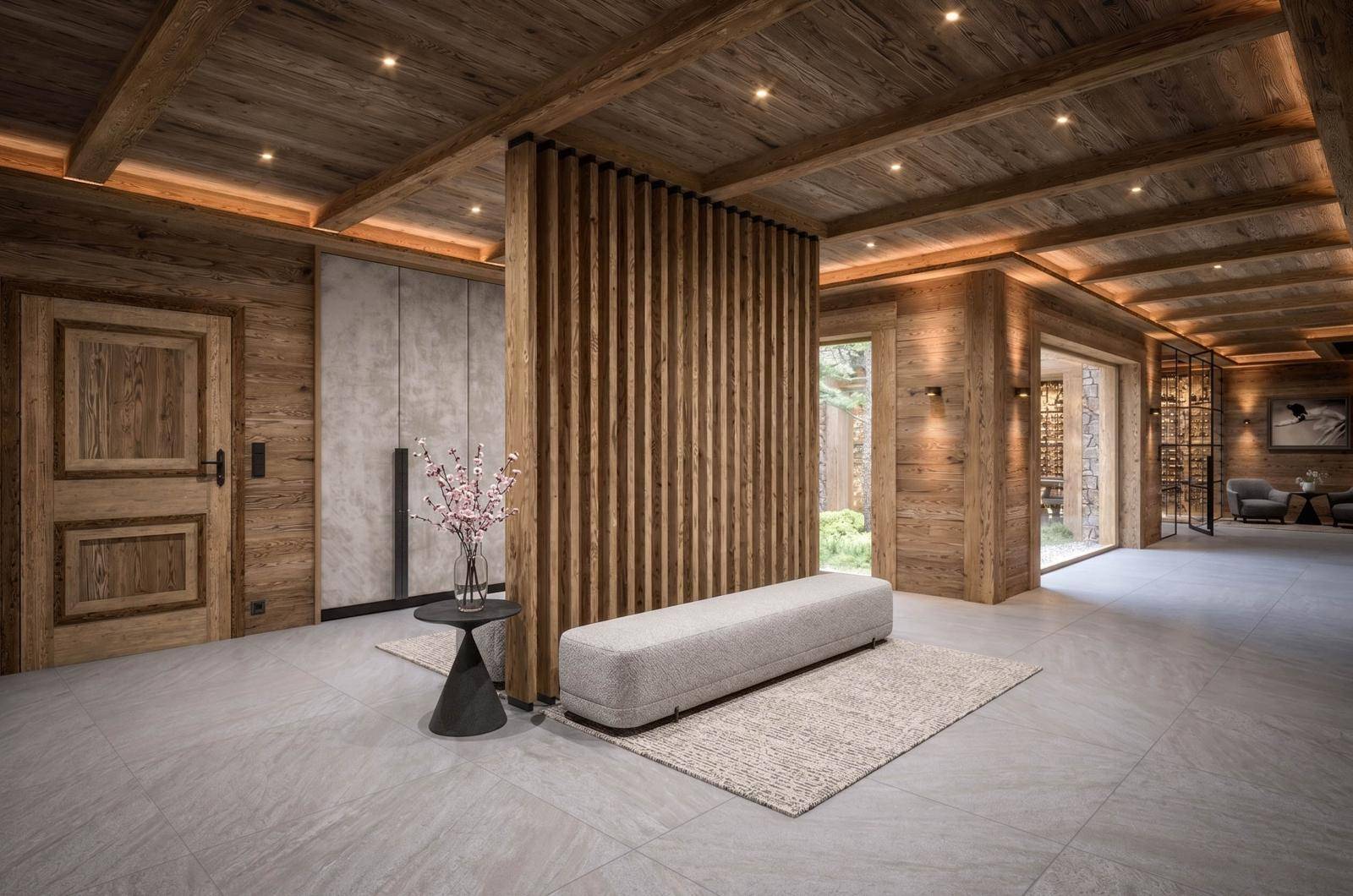 Eleganter Eingangsbereich mit Holzwänden, modernen Designelementen und Blick auf einen Weinkeller.