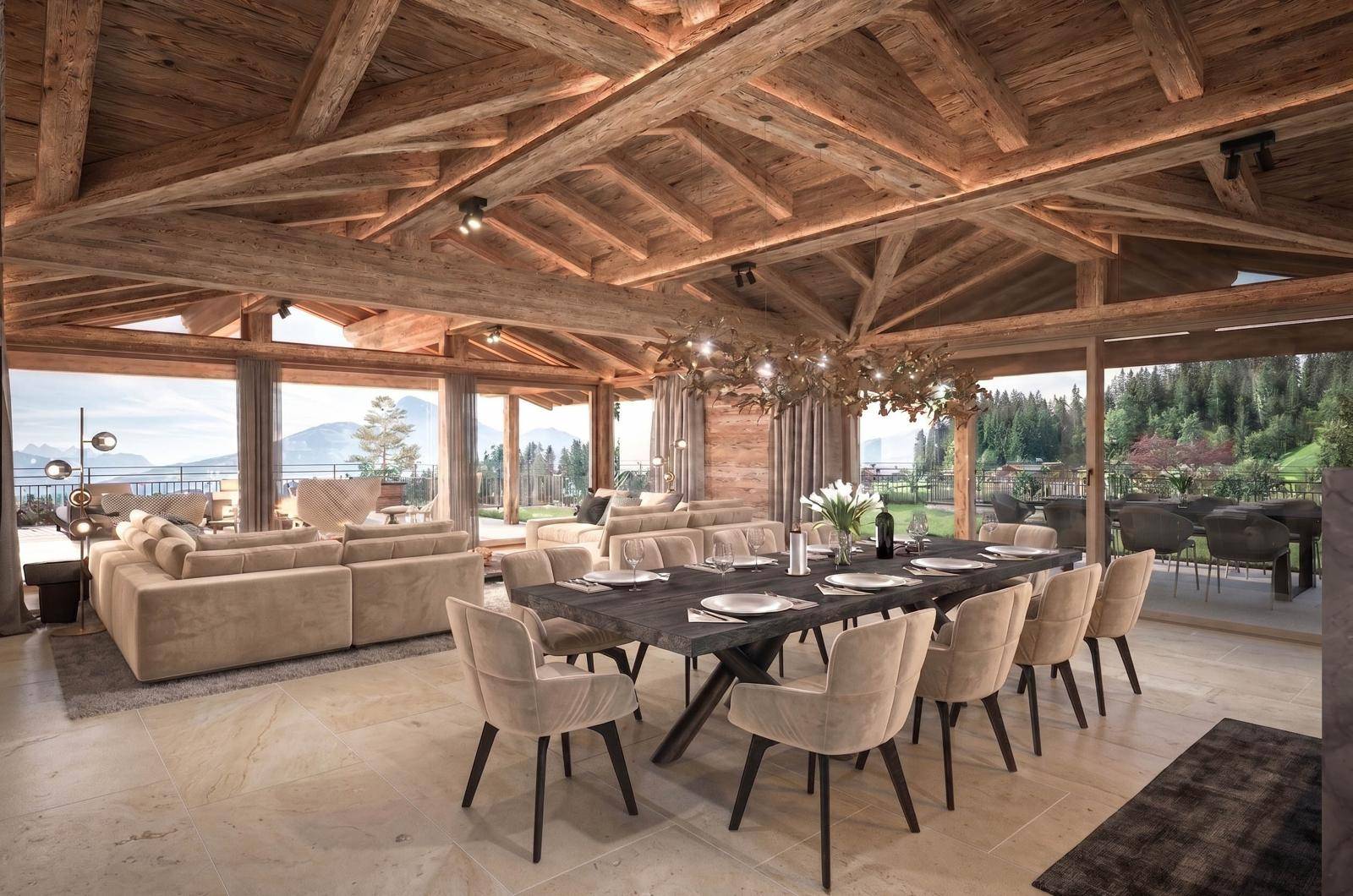 Geräumiger Wohn-Essbereich mit hohen Holzdecken, großen Fenstern und Panoramablick auf die Berge.