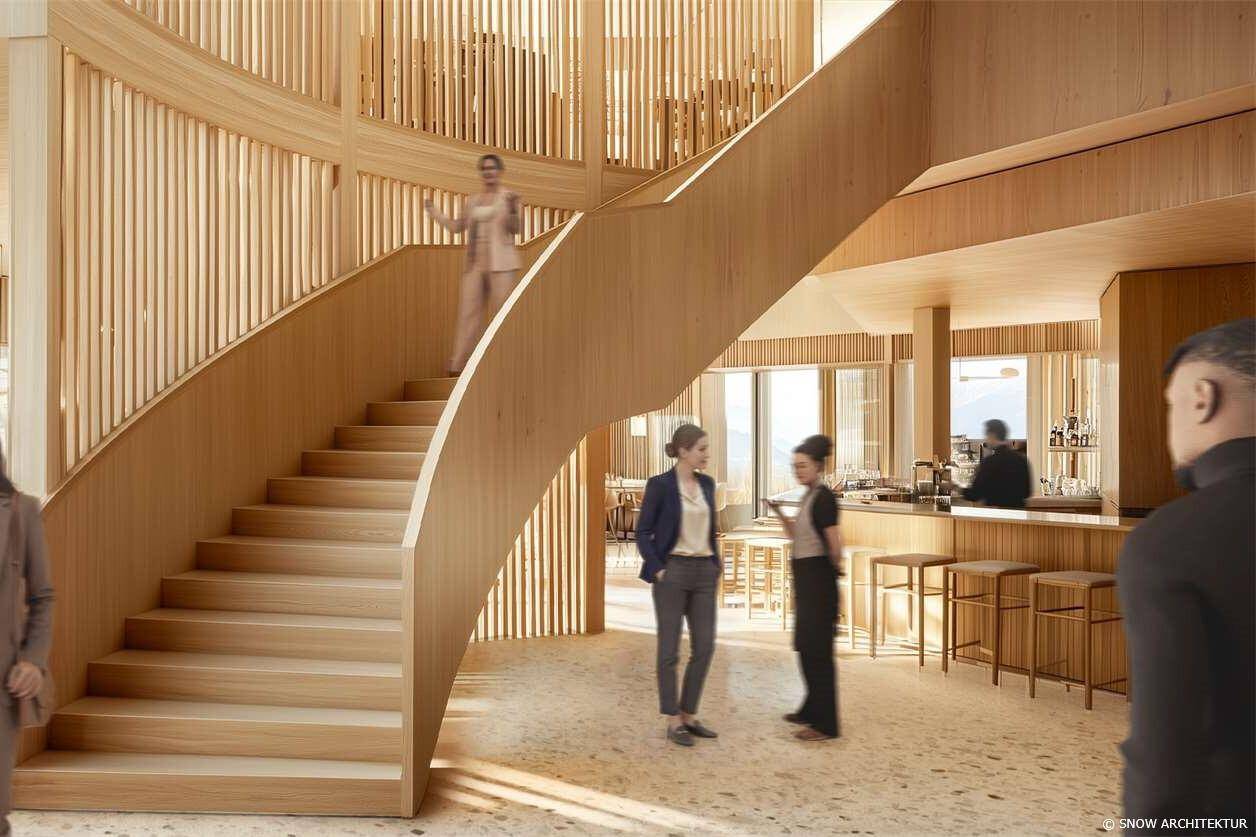 Elegante Holztreppe in einem hellen Empfangsbereich mit Bar und modernen Designelementen.