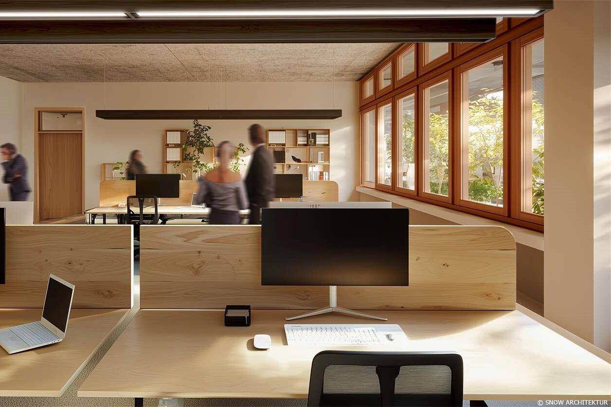 Modernes Büro mit Holzschreibtischen, großen Fenstern und Blick auf grüne Außenbereiche.