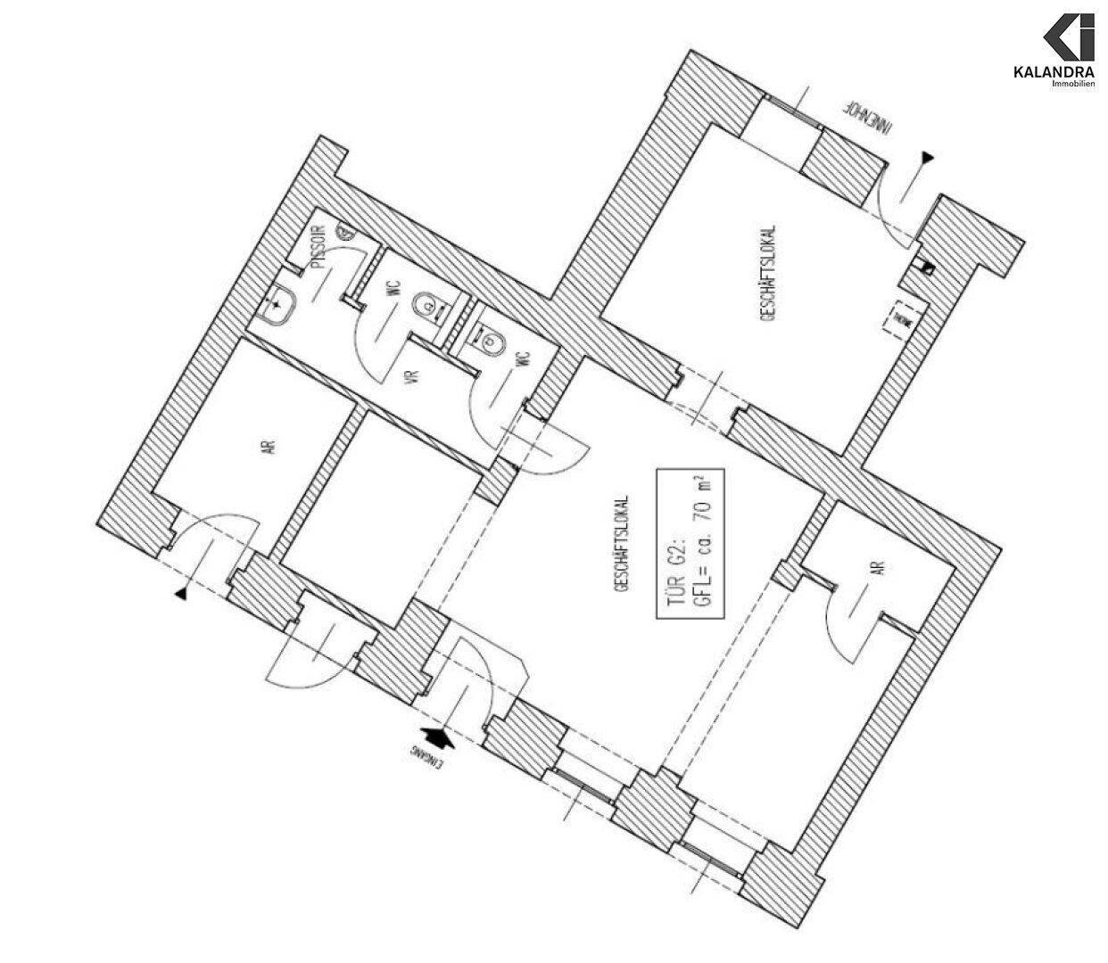 Grundrissplan eines Geschäftslokals mit zwei separaten Bereichen und Sanitäranlagen.