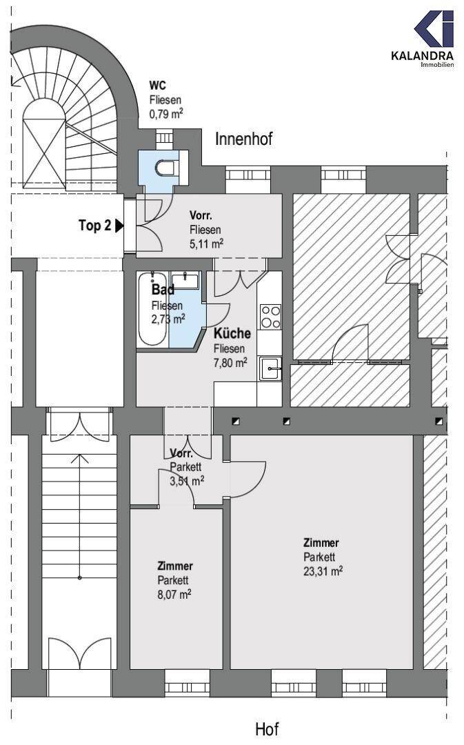 Grundriss einer Wohnung mit zwei Zimmern, Küche, Bad und separatem WC, inklusive Treppenhaus.