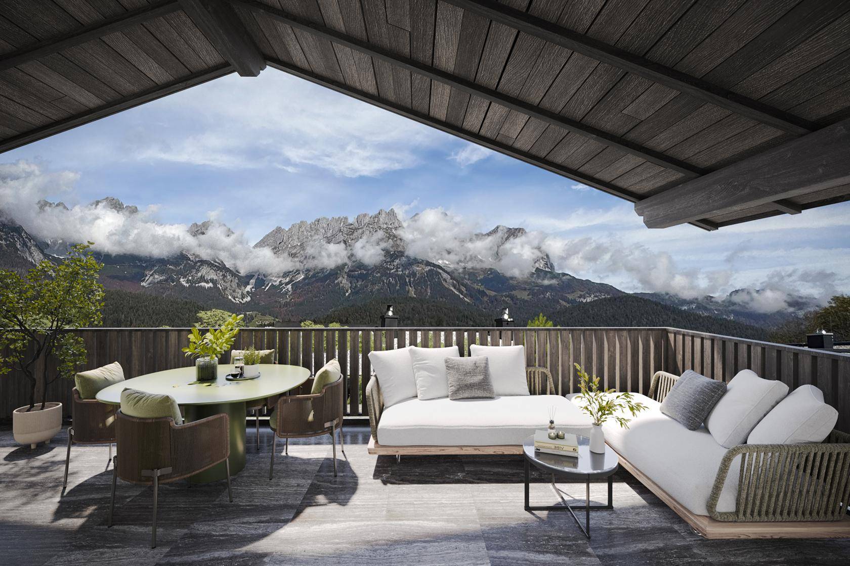 Großzügige überdachte Terrasse mit stilvollen Gartenmöbeln und spektakulärem Panoramablick auf die Berge.