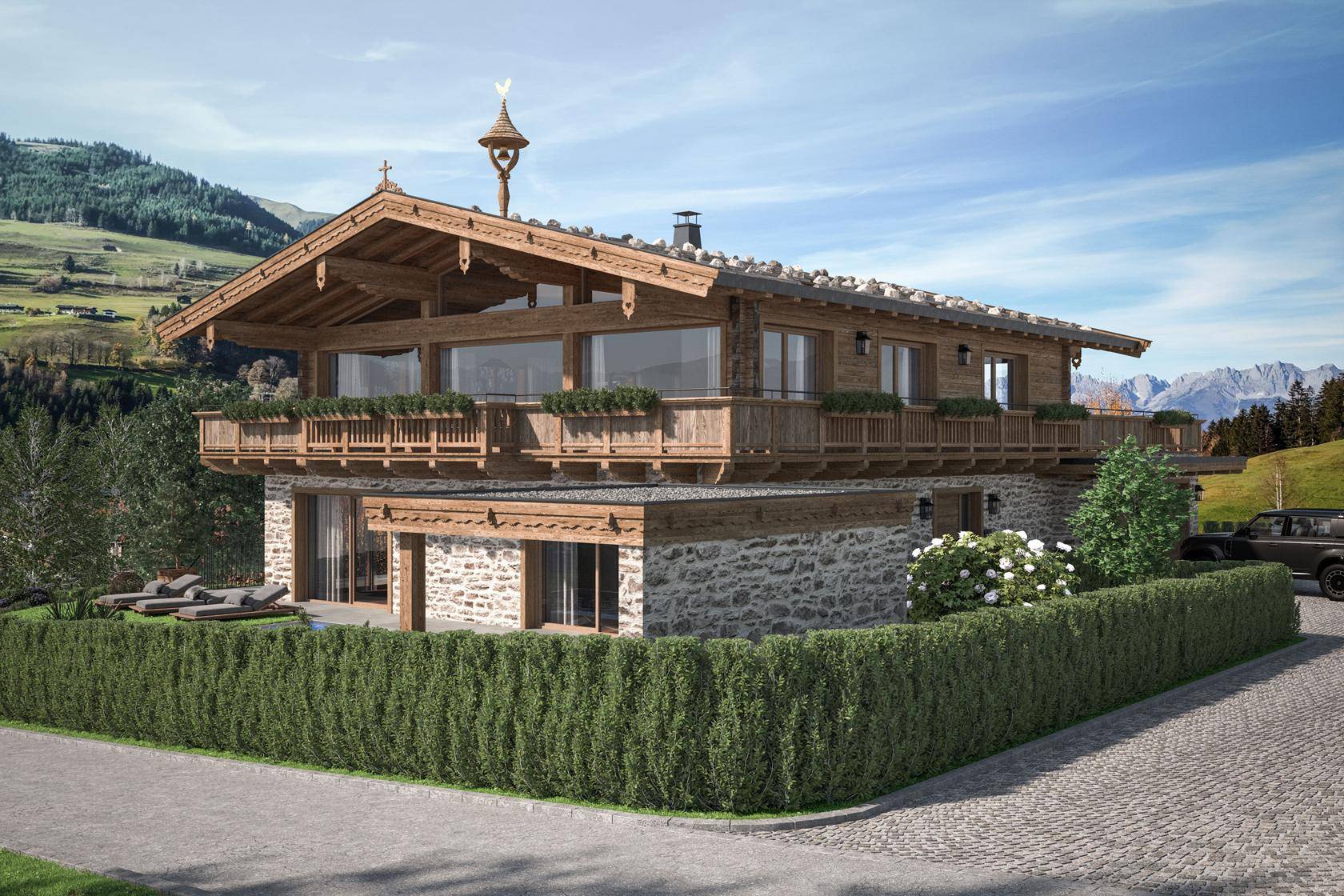 Modernes Chalet mit Holzfassade, Steinmauerwerk und großem Balkon in alpiner Landschaft.