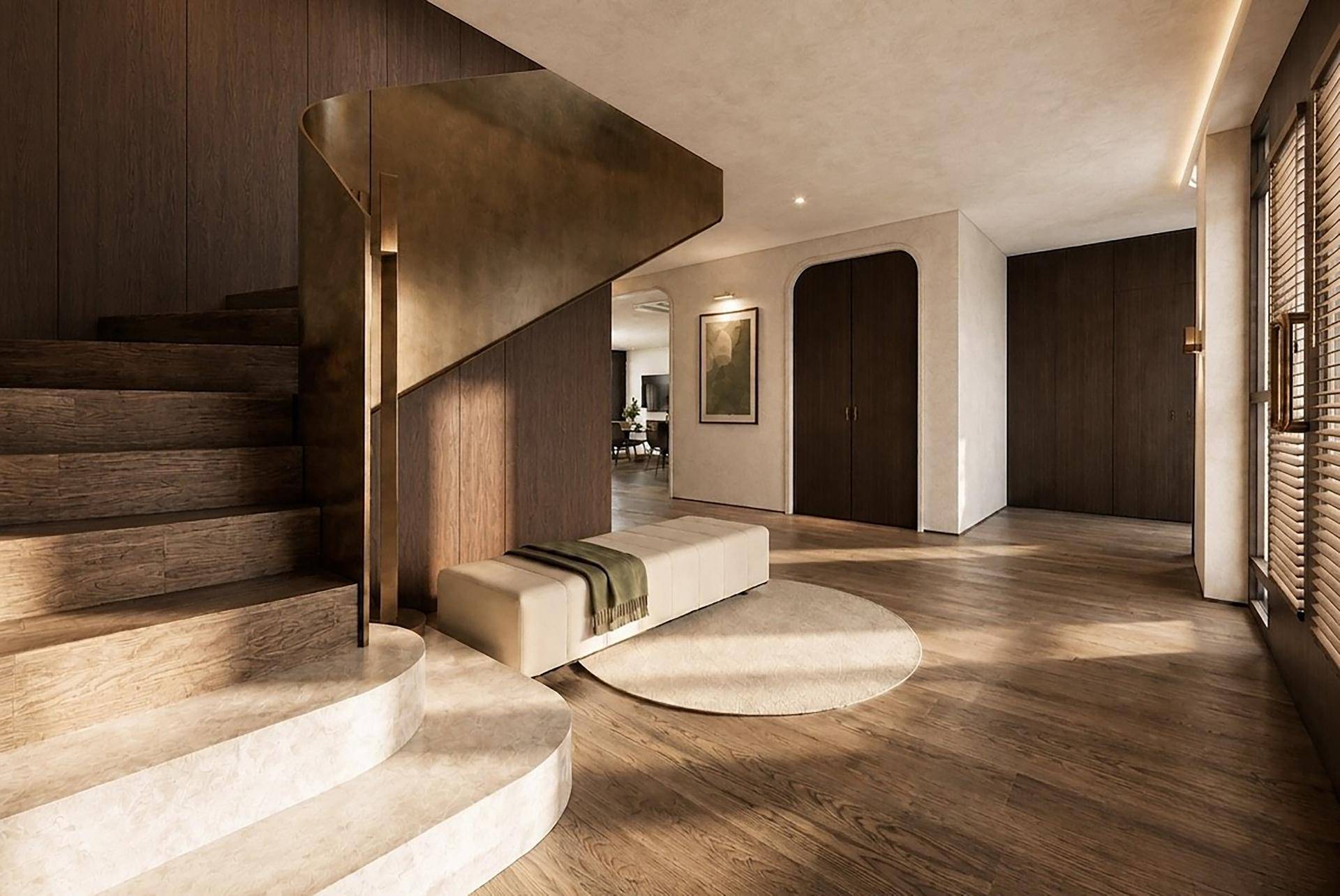 Elegante Eingangshalle mit geschwungener Treppe, Holzboden und moderner Sitzbank.
