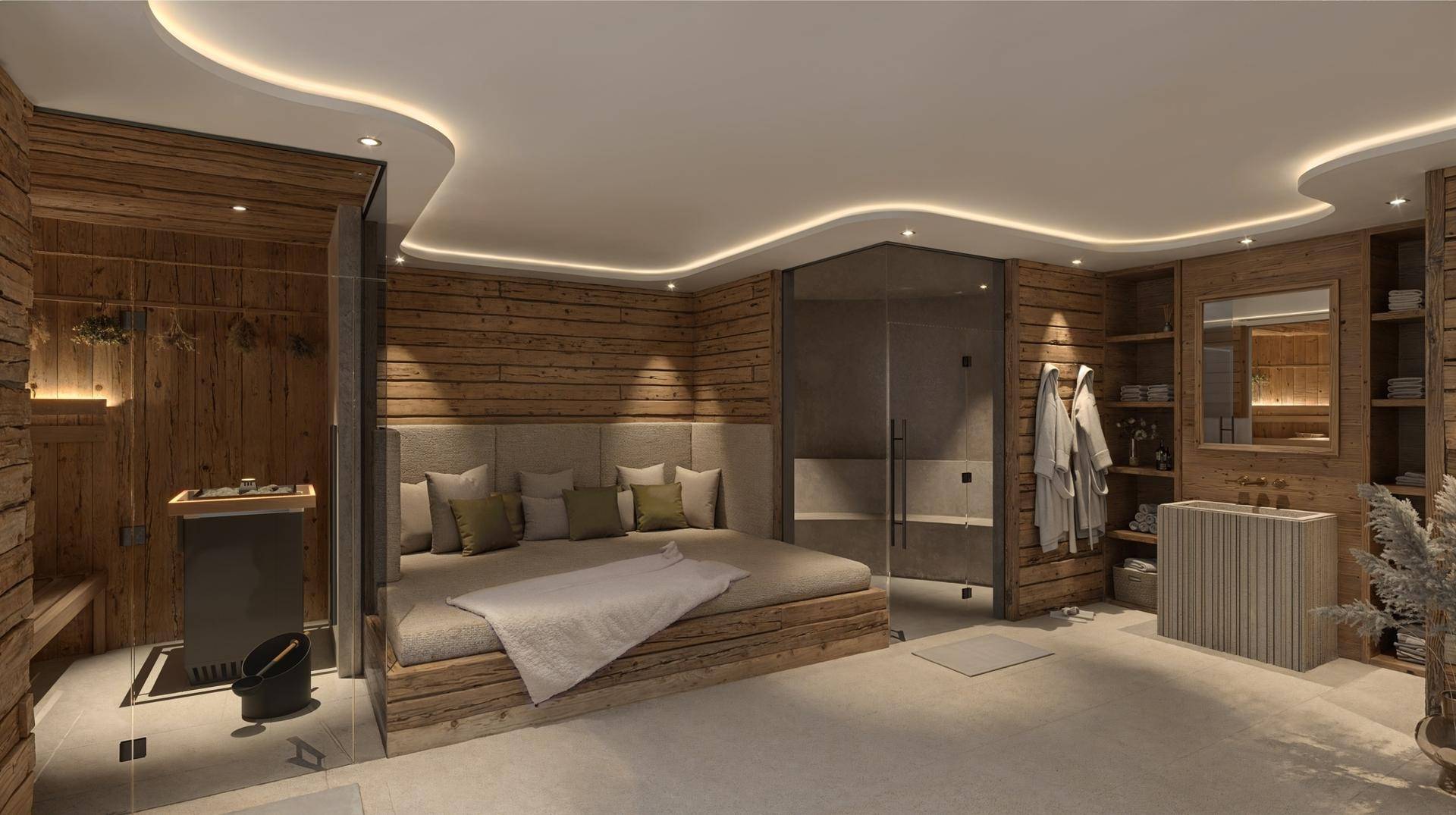 Exklusiver Wellnessbereich mit Sauna, Dusche und großzügiger Liegefläche.