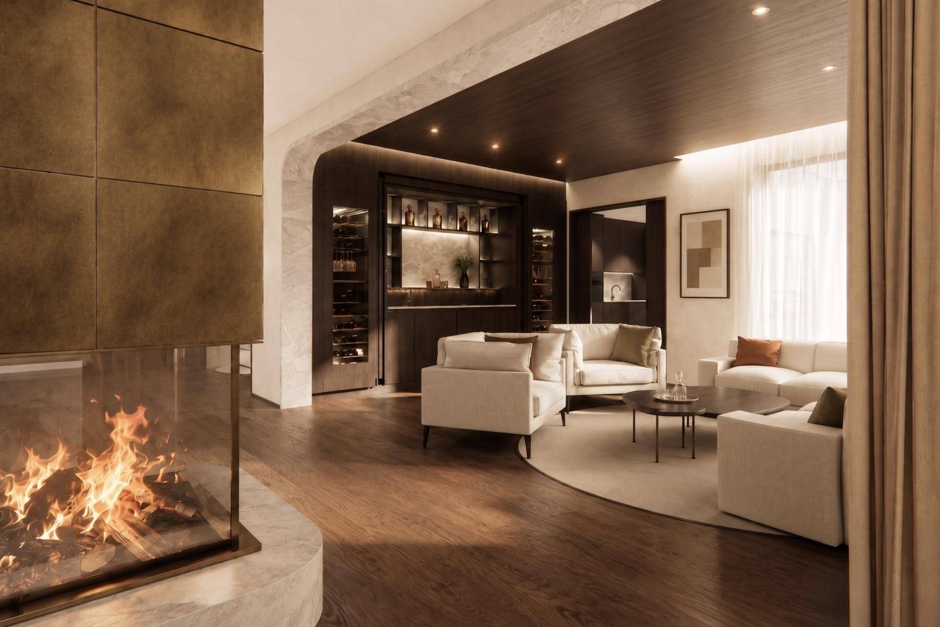 Gemütlicher Wohnbereich mit Kamin, bequemen Sofas und einer eleganten, integrierten Hausbar.