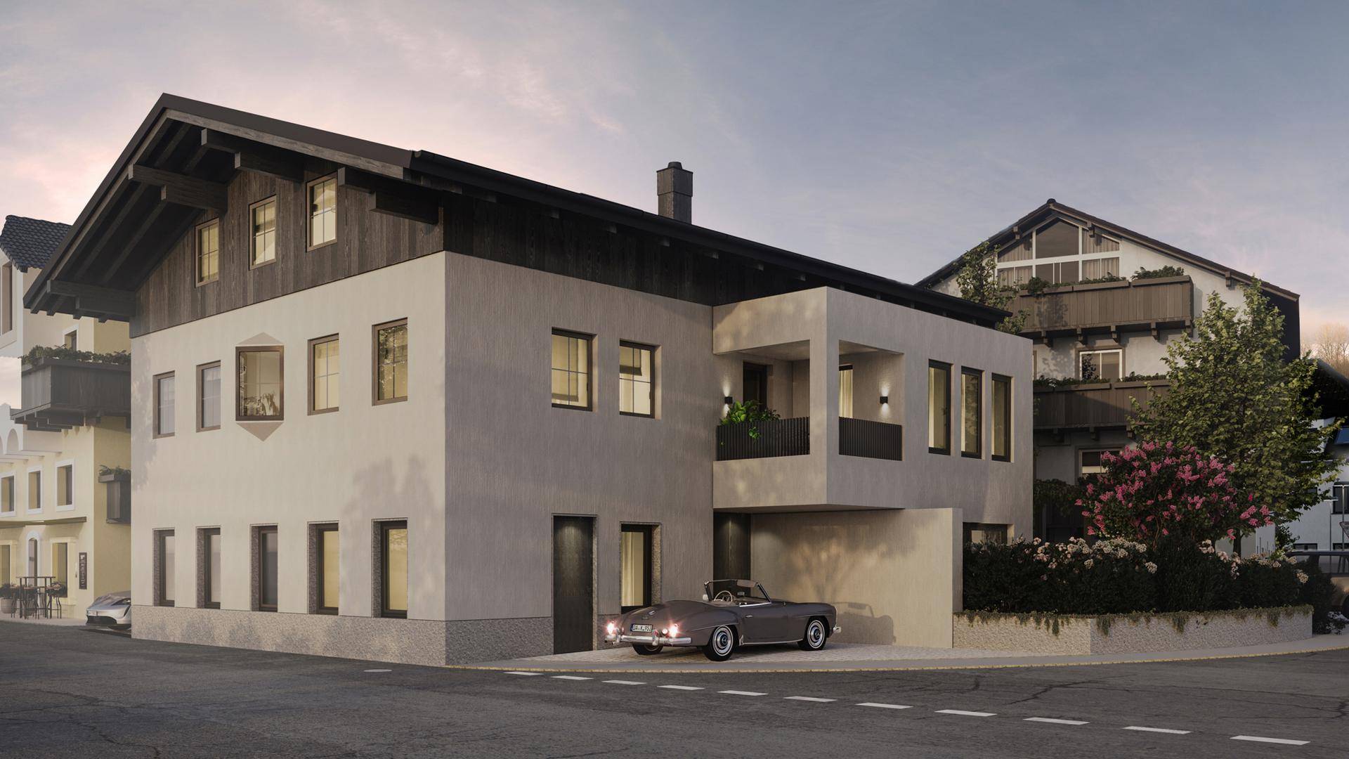 Modernisiertes Gebäude mit traditionellen Elementen und einem klassischen Auto davor.