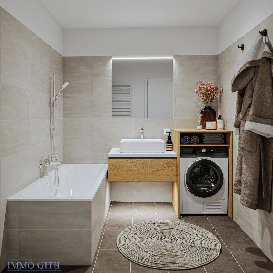 Modernes Badezimmer mit Badewanne, Einzelwaschbecken und integrierter Waschmaschine.