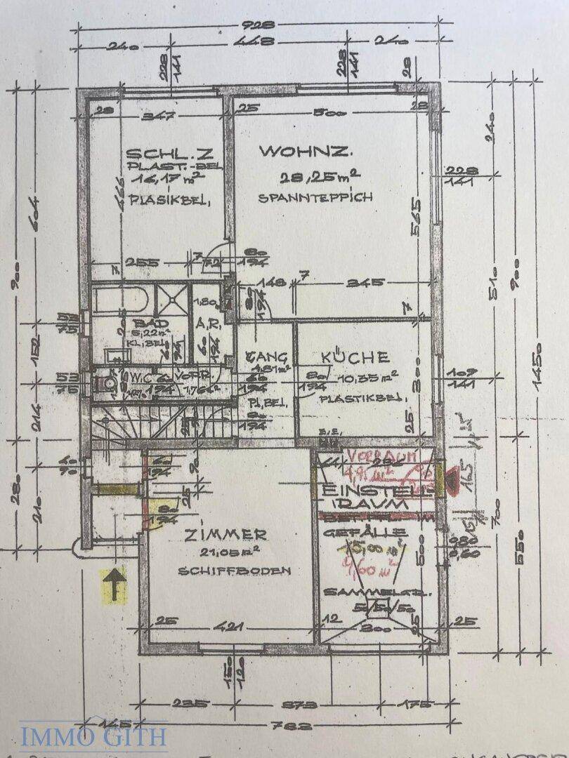 Grundriss des Erdgeschosses mit Wohnzimmer, Küche und Schlafzimmer, zeigt die Raumaufteilung.