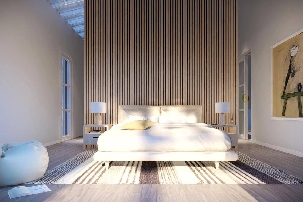 Helles Schlafzimmer mit einem modernen Bett, einer Holzwandverkleidung und hohen Fenstern.