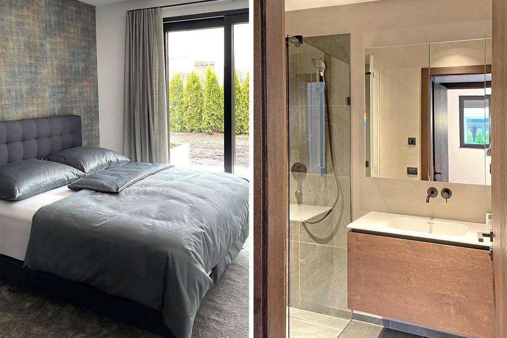 Schlafzimmer mit Doppelbett und Badezimmer mit Dusche in modernem Design.