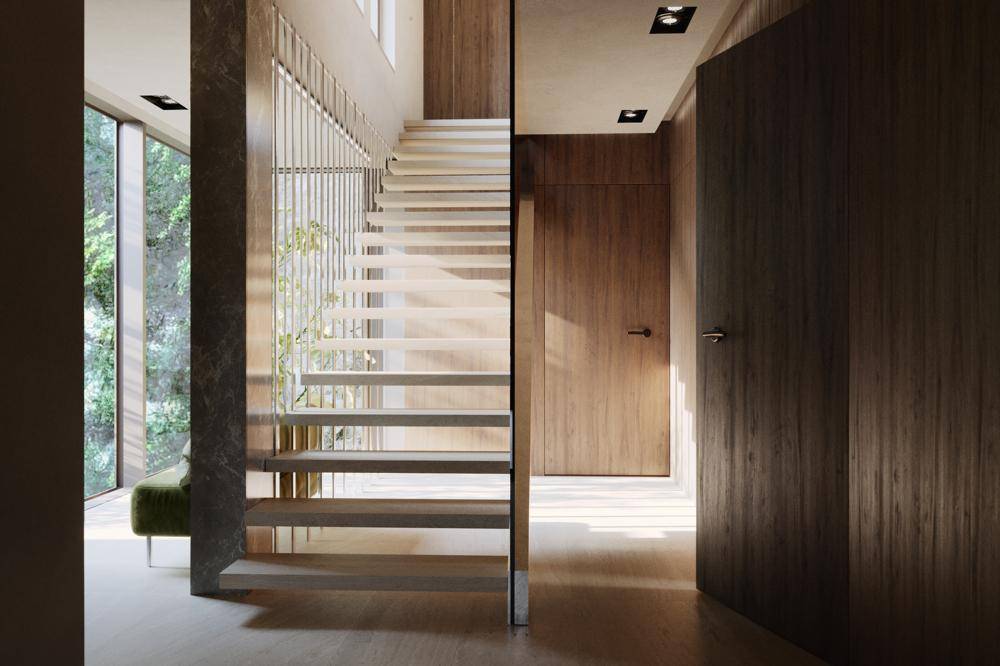 Heller Eingangsbereich mit moderner schwebender Treppe und Holzwänden.