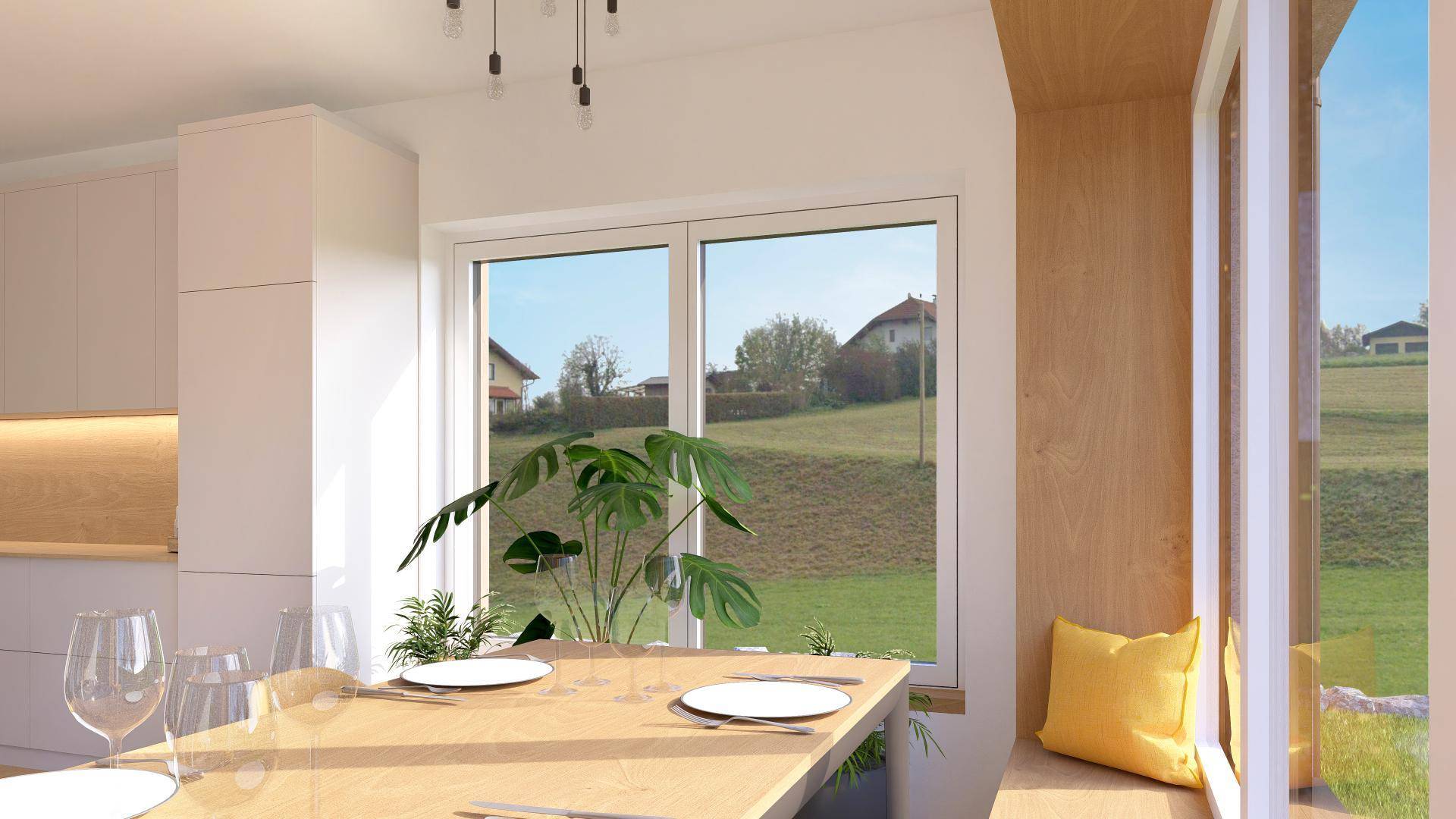 Gemütlicher Essbereich mit großem Fenster, das einen weiten Blick auf die umliegende Landschaft bietet.