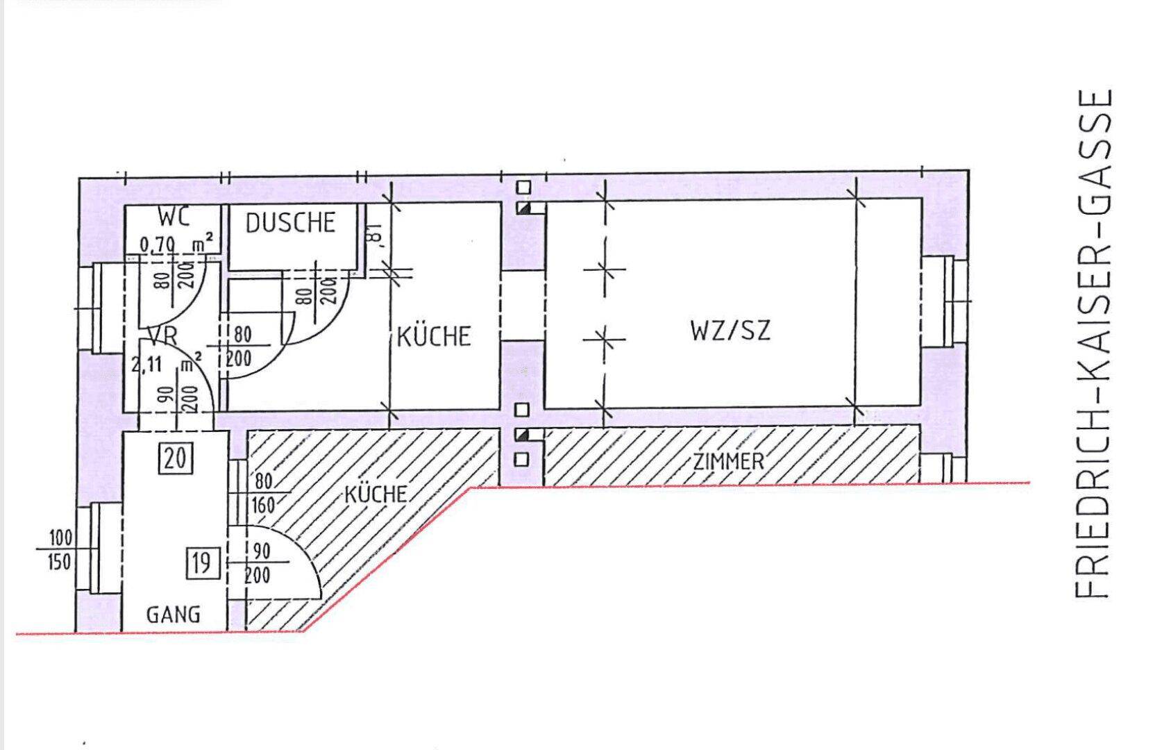 Grundriss einer Wohnung mit separater Küche, Bad und großem Wohn-/Schlafzimmer.