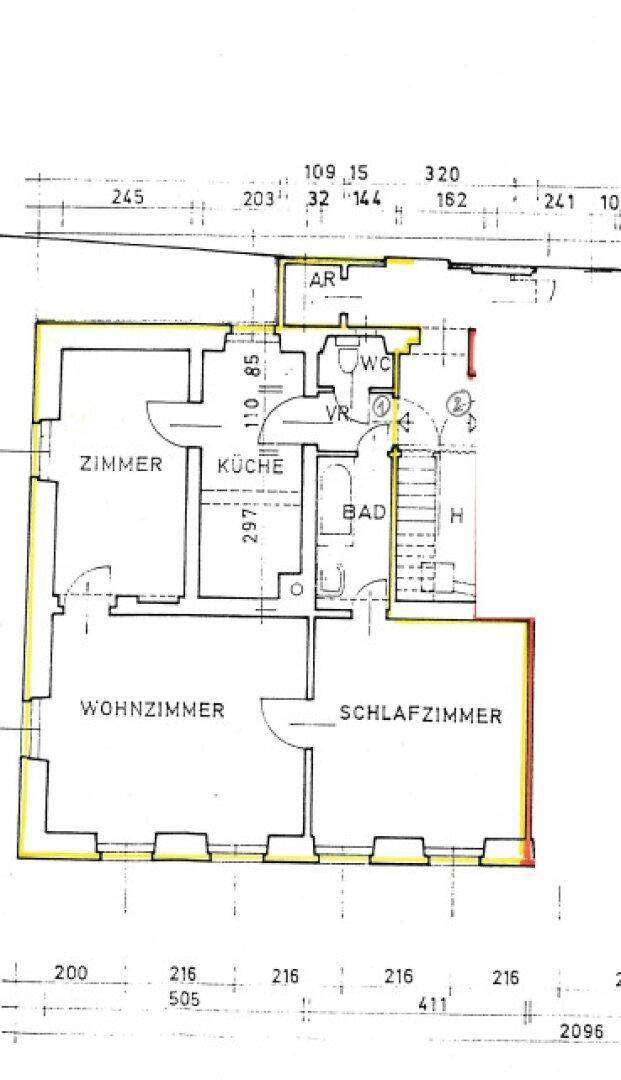 Grundriss einer Wohnung mit Zimmern, Küche, Bad und WC, inklusive Maßangaben.