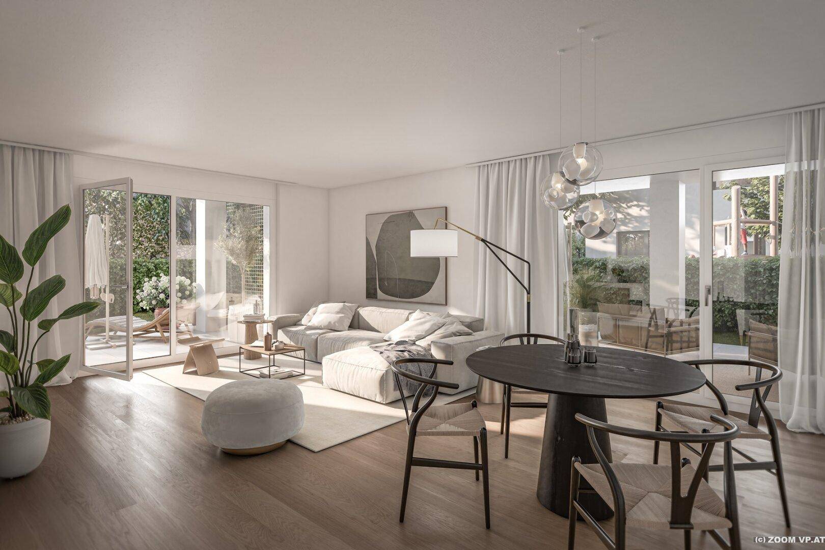 Heller Wohn- und Essbereich mit Holzboden, modernen Möbeln und Zugang zur Terrasse.
