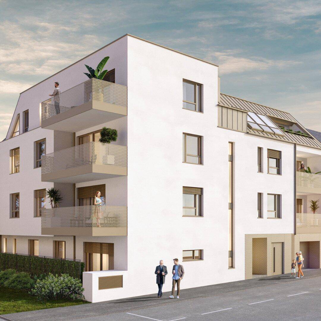 Ansicht der modernen Wohnanlage von der Straßenseite mit klaren Linien und mehreren Balkonen.
