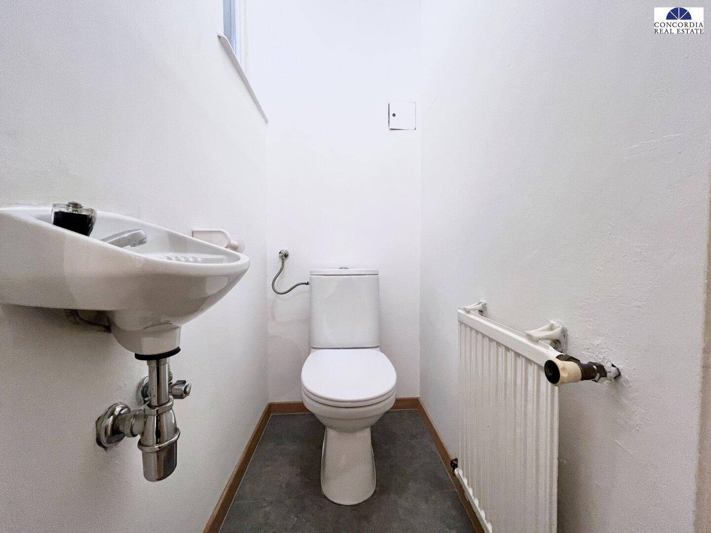 WC mit Handwaschbecken