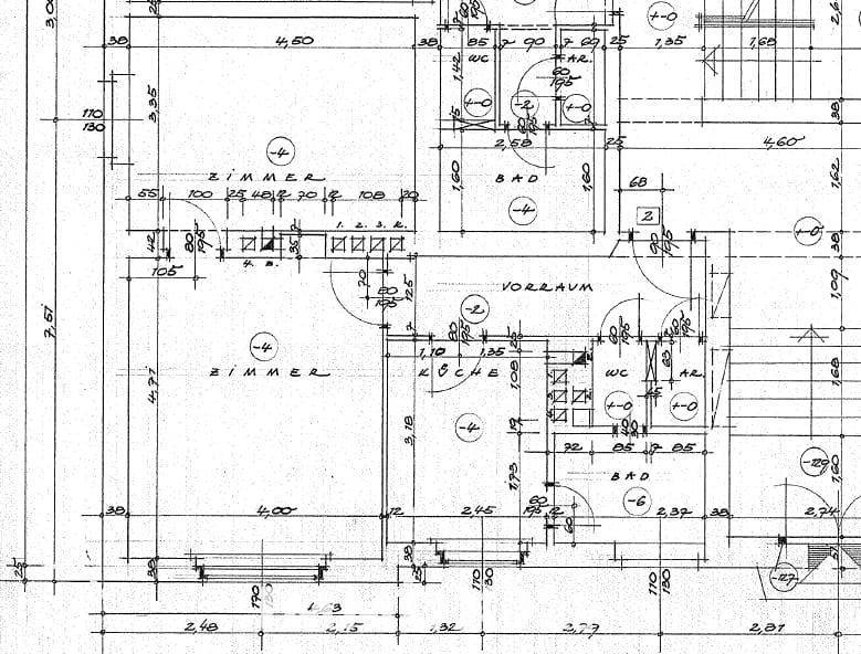 Grundrissplan mit verschiedenen Zimmern, Küche, Bad und WC, inklusive Bemaßungen.