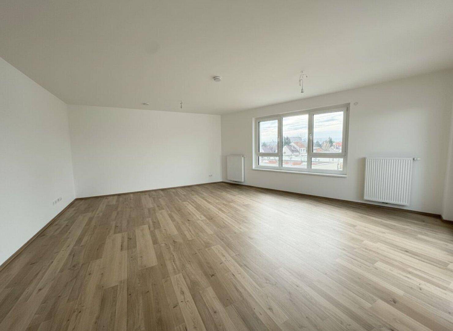 Familienwohnen in Wiener Neustadt: 3-Zimmer-Erstbezug mit Balkon im „ein viertel grün“ - Widok 2