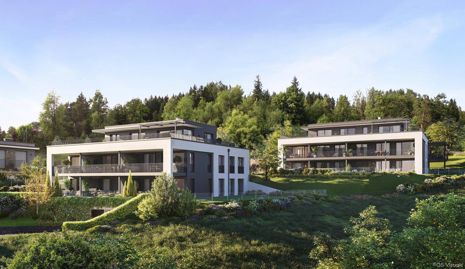 Visualisierung moderner Apartmentgebäude in Hanglage, eingebettet in eine grüne, bewaldete Landschaft.